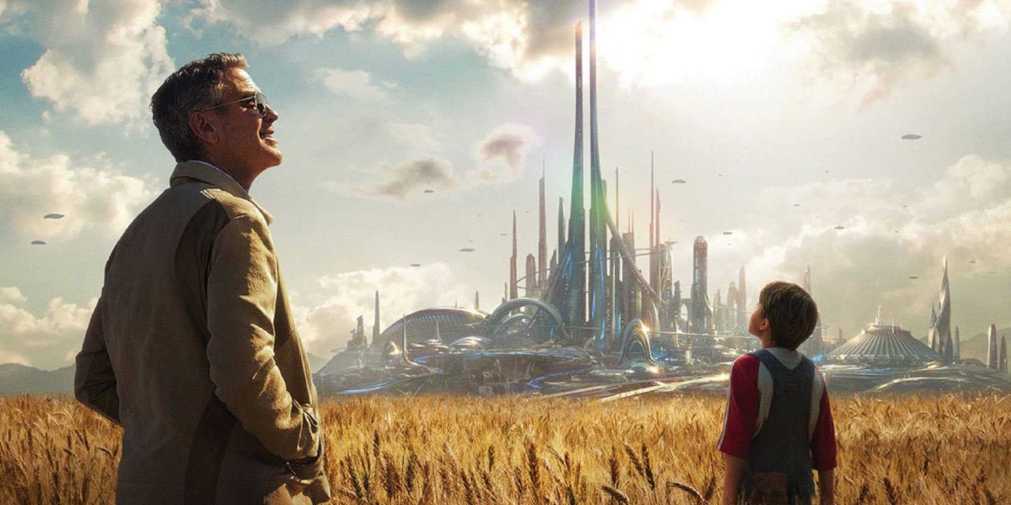 George Clooney and a child in a field with a futuristic world off in the distance.