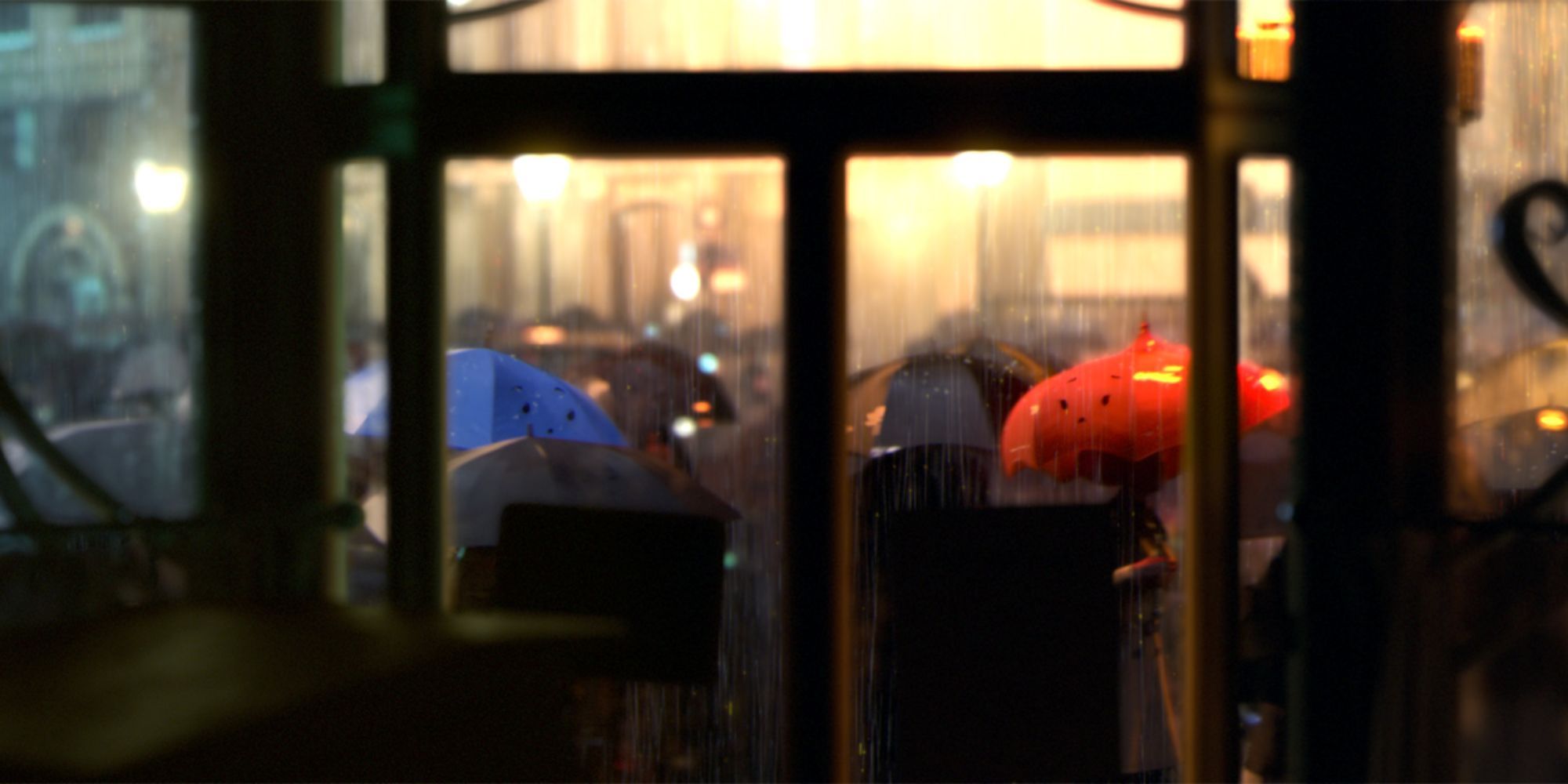 Animated umbrellas with faces looking at each other in the rain