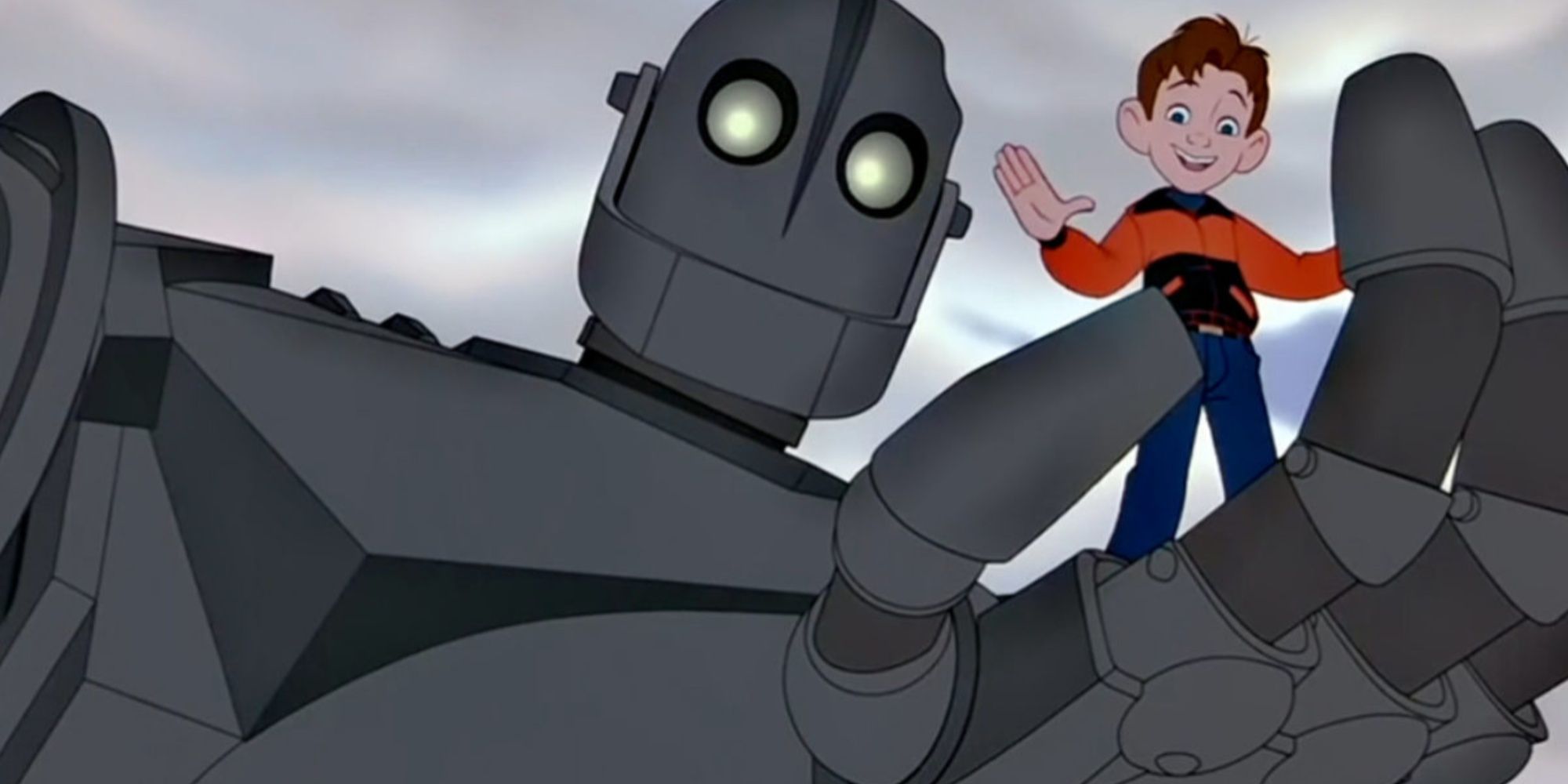 Hogarth standing on the robot's hand in The Iron Giant