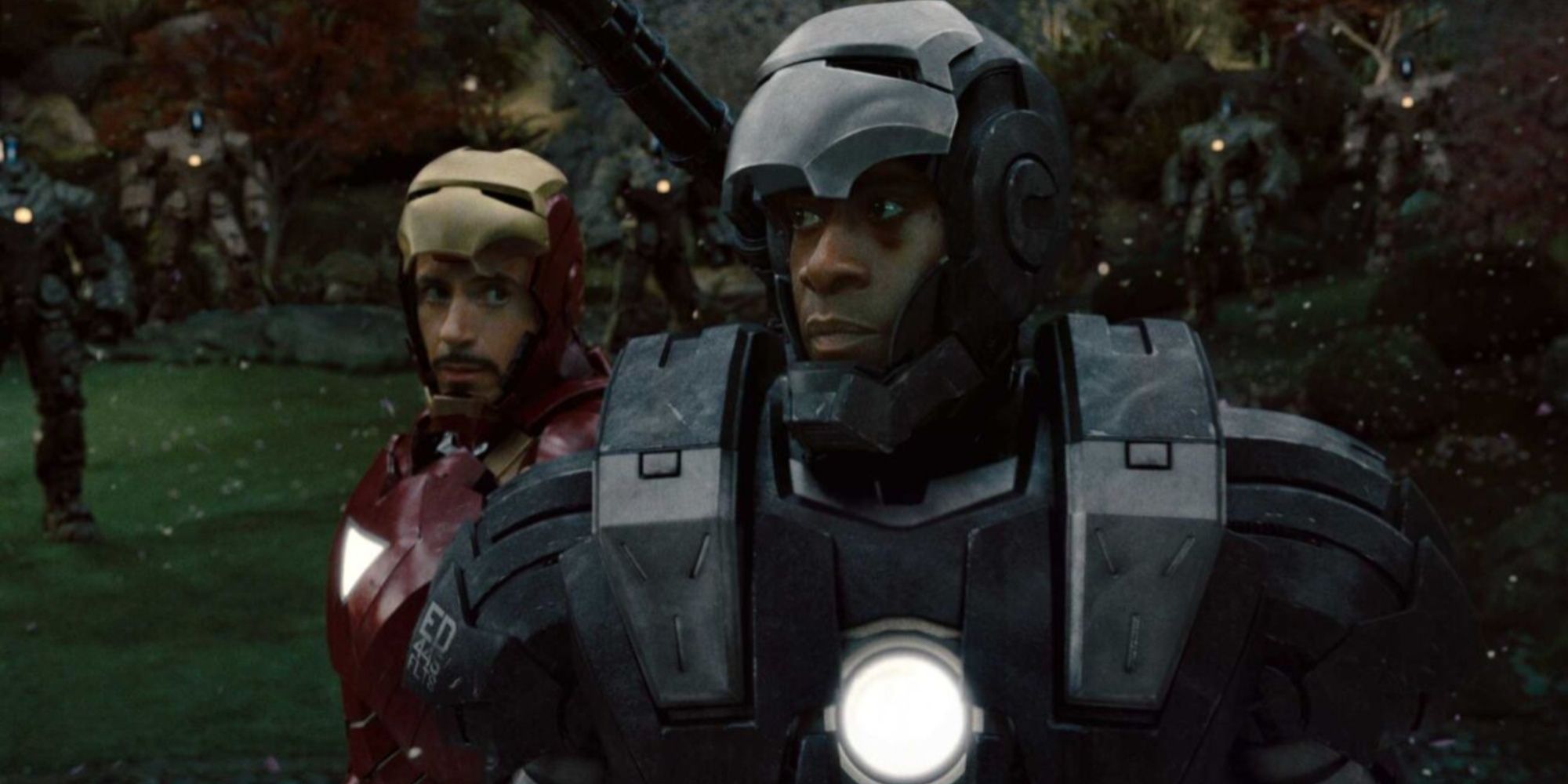 James Rhodes (Don Cheadle) as War Machine, and Tony Stark (Robert Downey Jr.) as Iron Man, in Iron Man 2