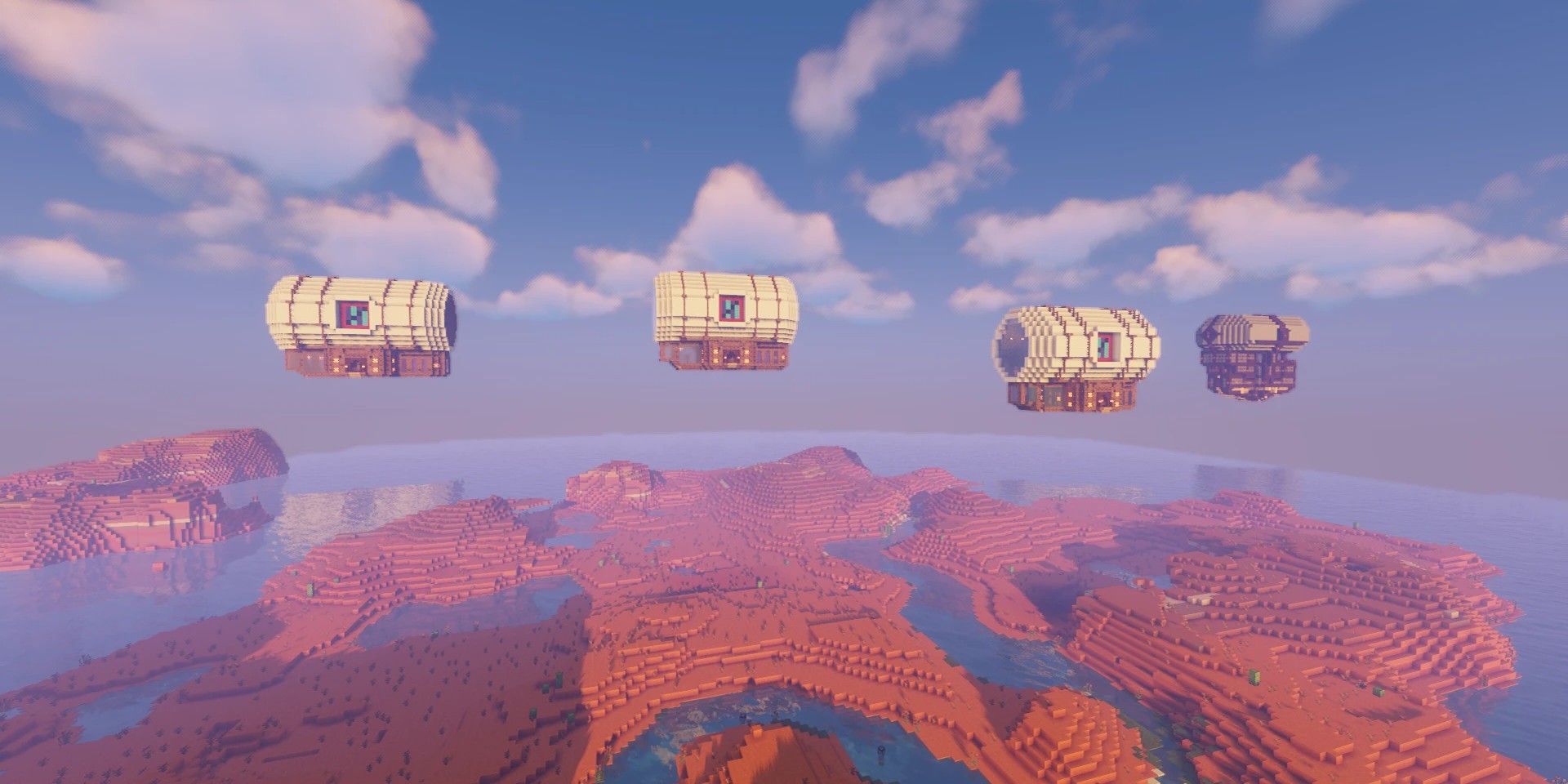 Minecraft airships flying in a line over the deset