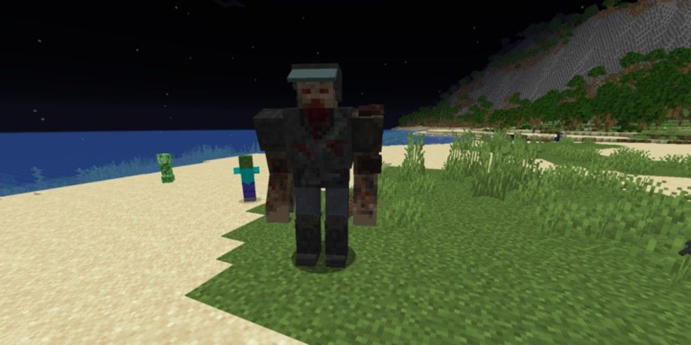 A large, modded Minecraft zombie stands on the beach at night