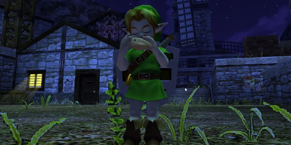 Ocarina of Time link playing the ocarina at night in village