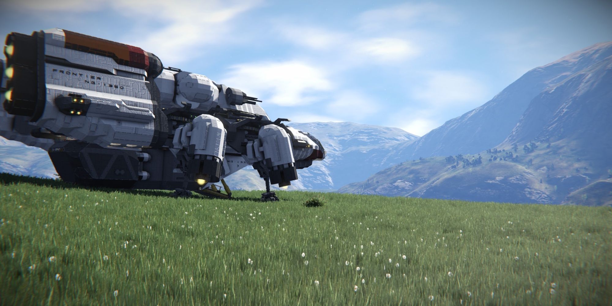 A red and white spaceship on a grassy planet in Space Engineers.
