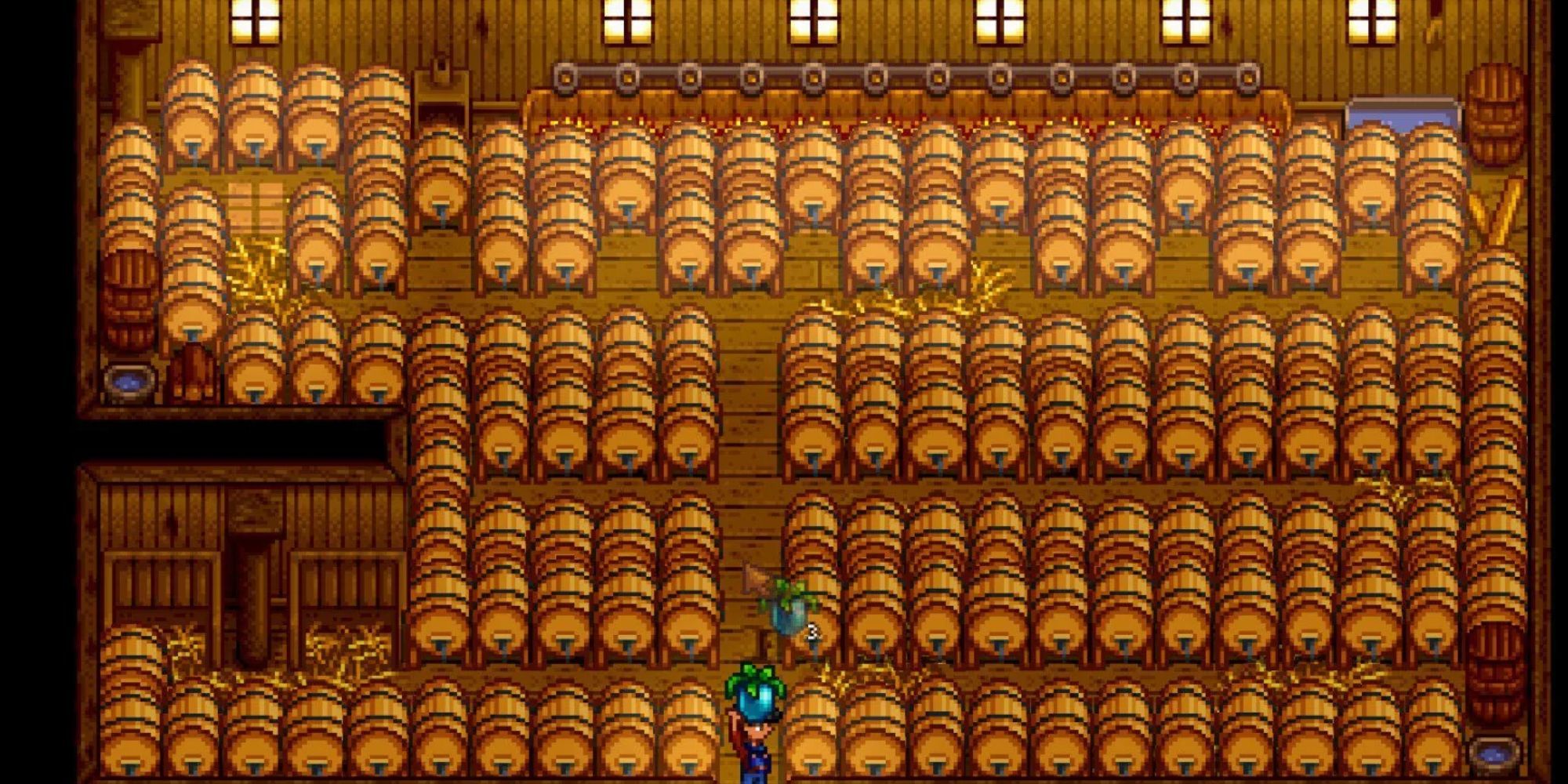 Kegs in a barn in Stardew Valley.