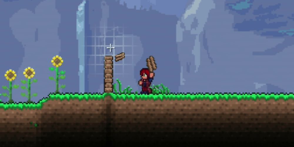 Terraria player stacking blocks