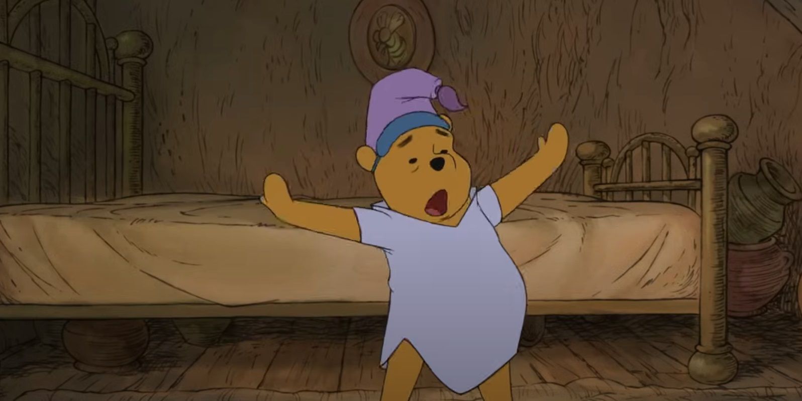 WinnieThePooh stretching as he gets out of bed