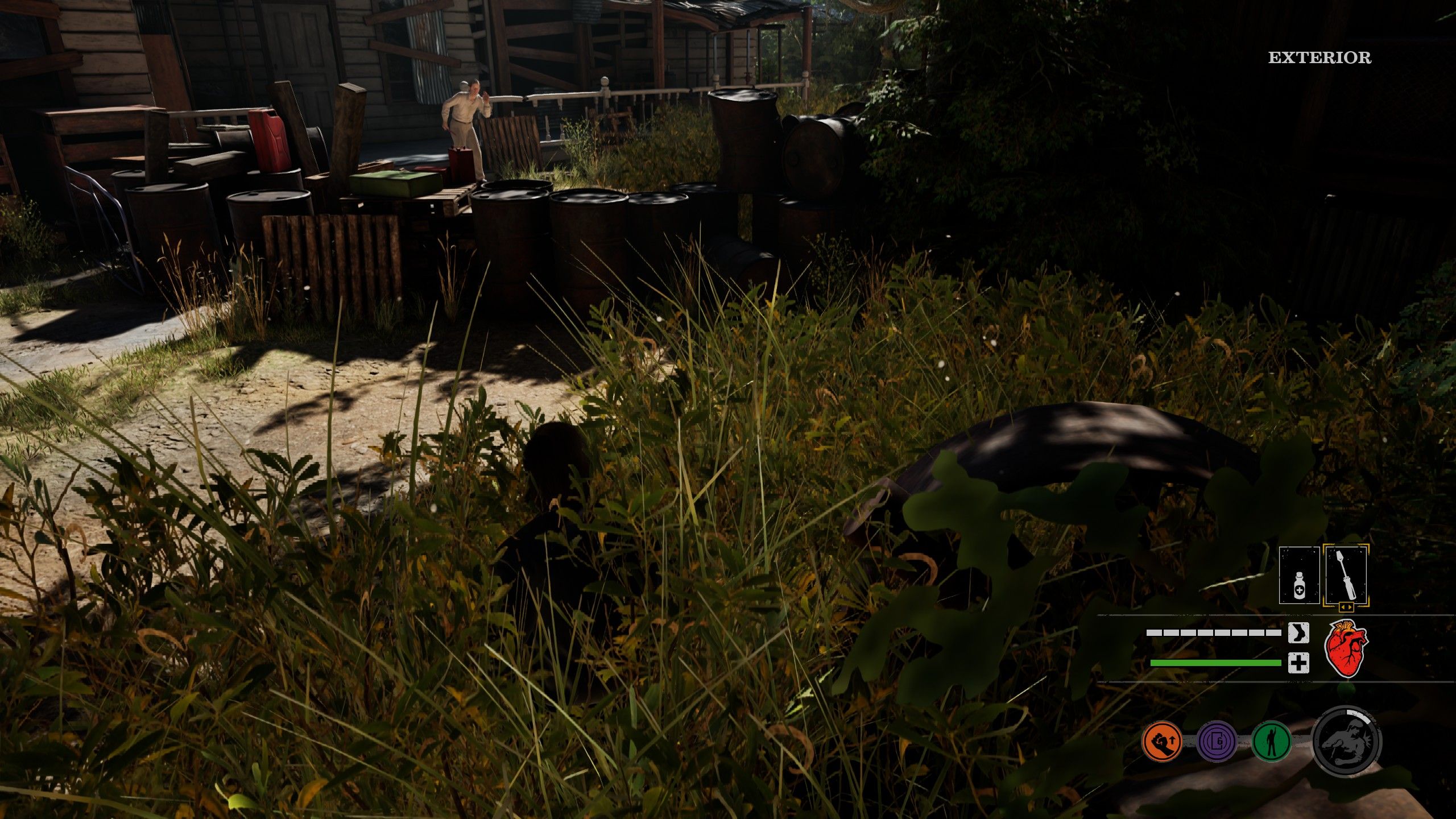 The Texas Chain Saw Massacre survivor hiding in the grass as a killer stalks them