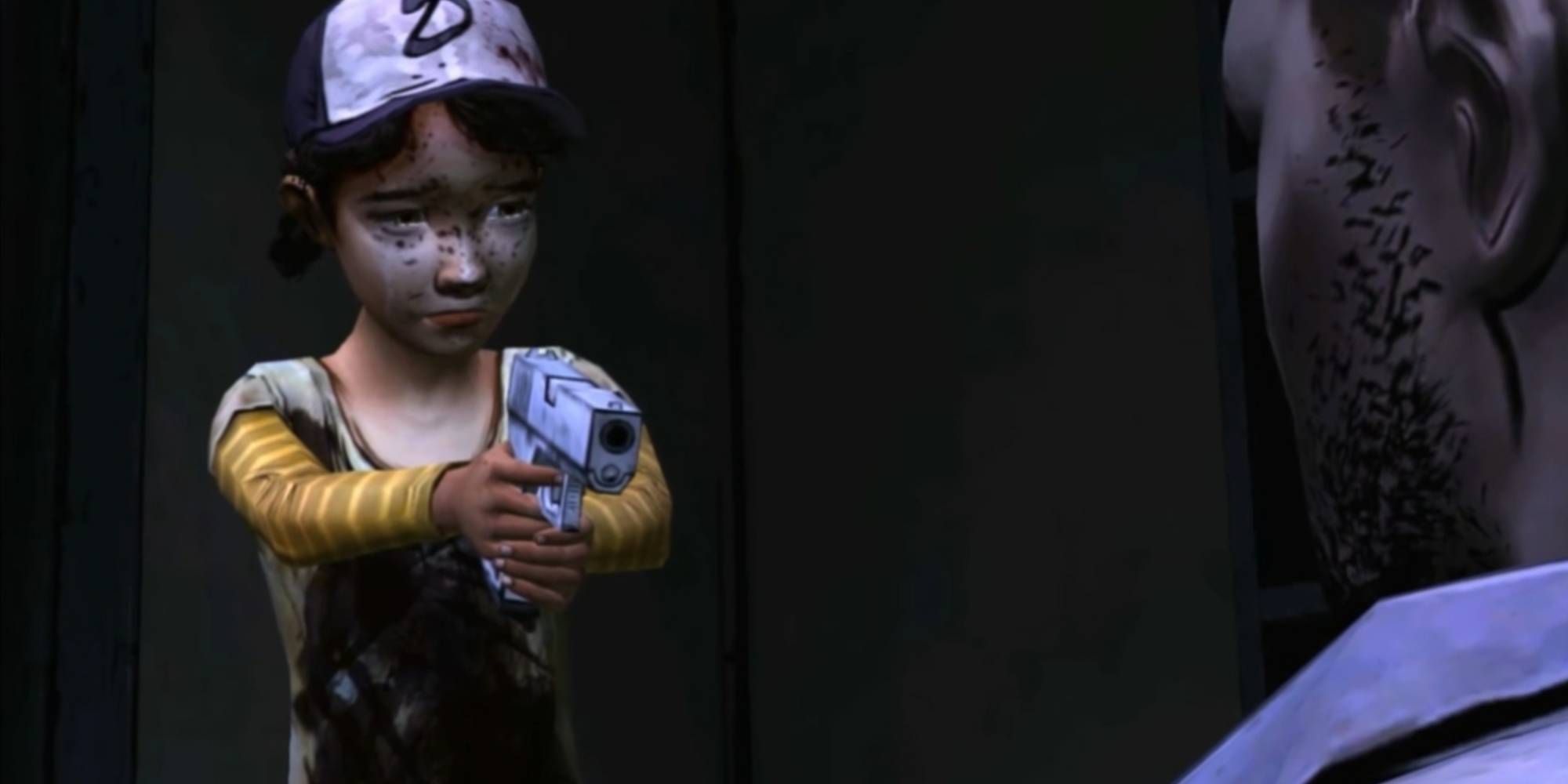 Clementine Preparing to End Lee's Suffering After Becoming Infected in The Walking Dead