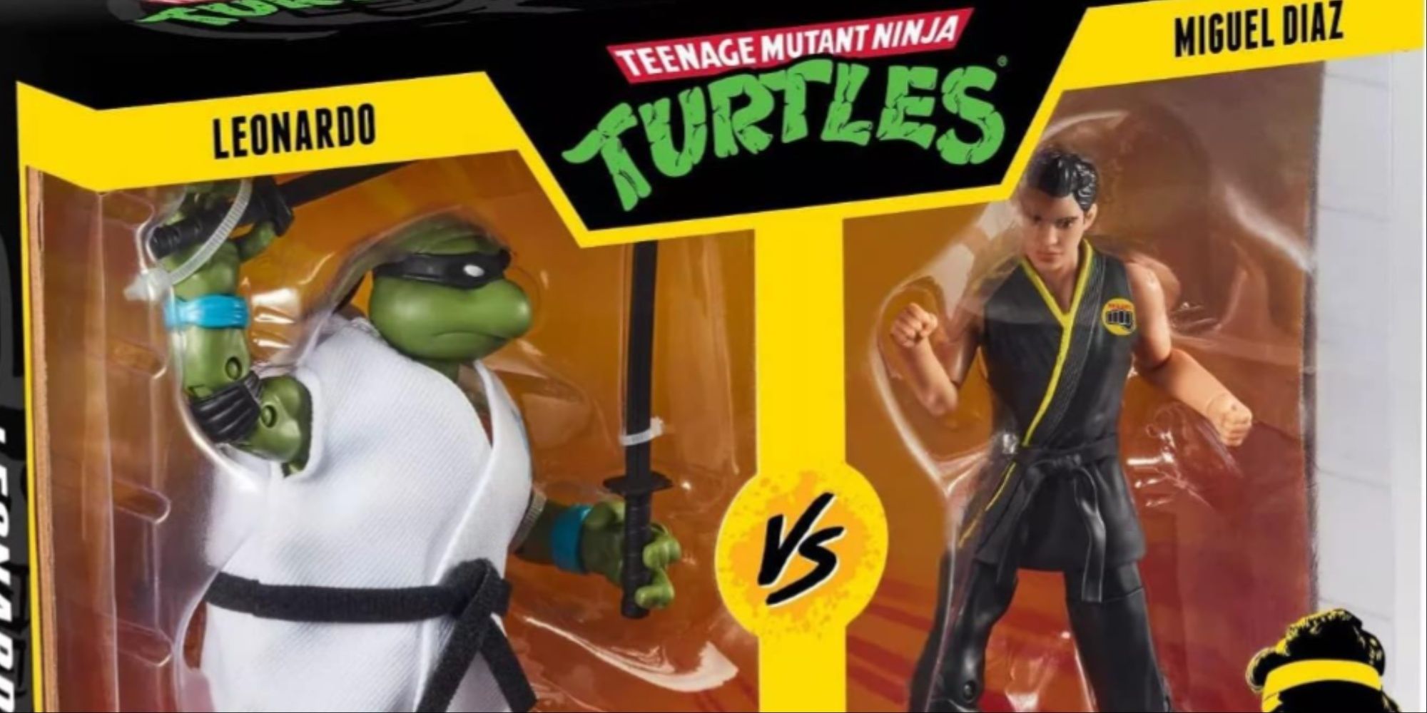An image of the product box for an action figure set of Leonardo in a white karate robe with a black belt and Miguel Diaz from Cobra Kai.