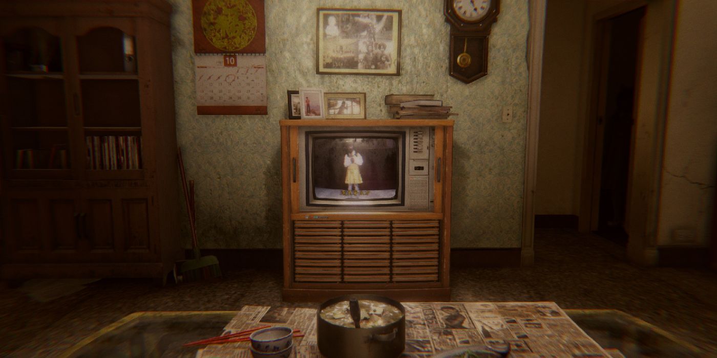 a room with a TV in the center in Devotion
