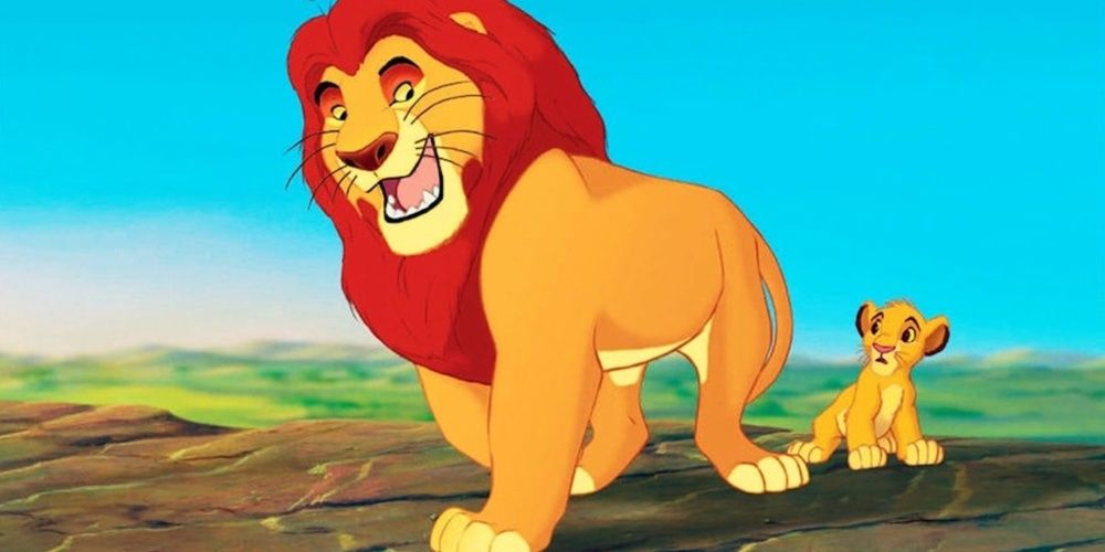 Mufasa and Young Simba walking together in Disney's Lion King.