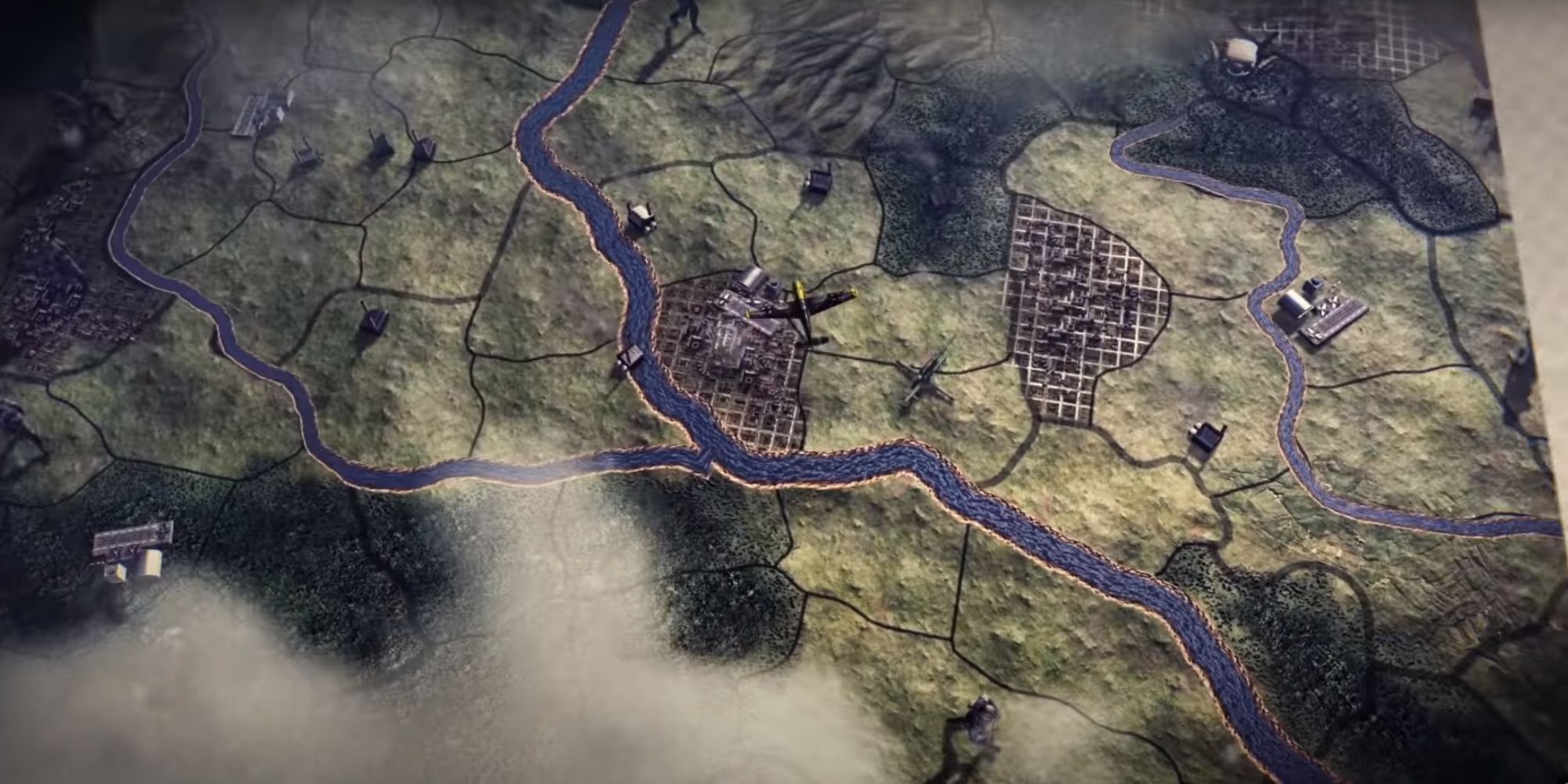 A birds-eye view of a strategic map showing rivers, towns, and military units.