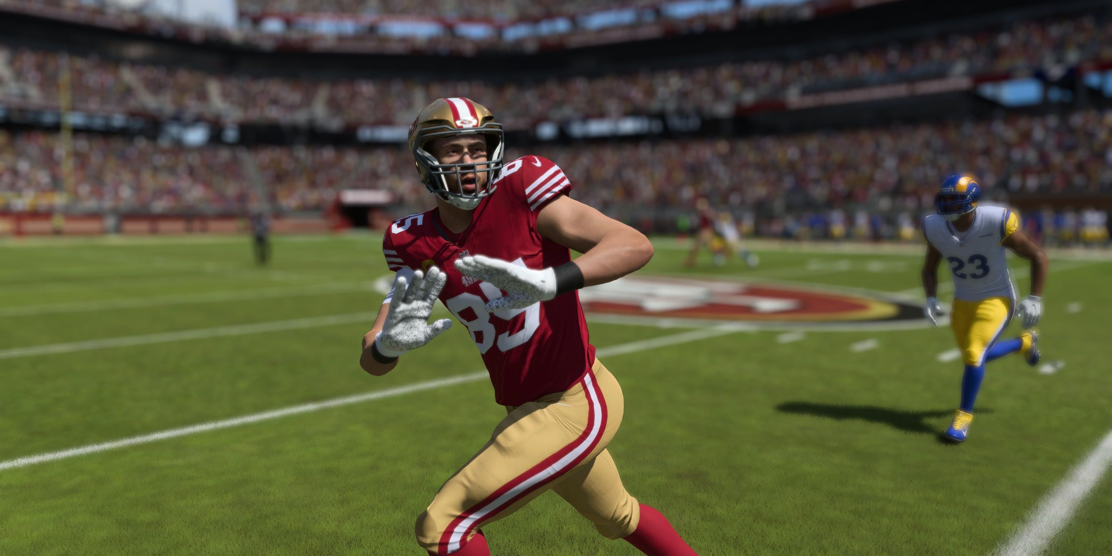 george kittle attempting to make catch
