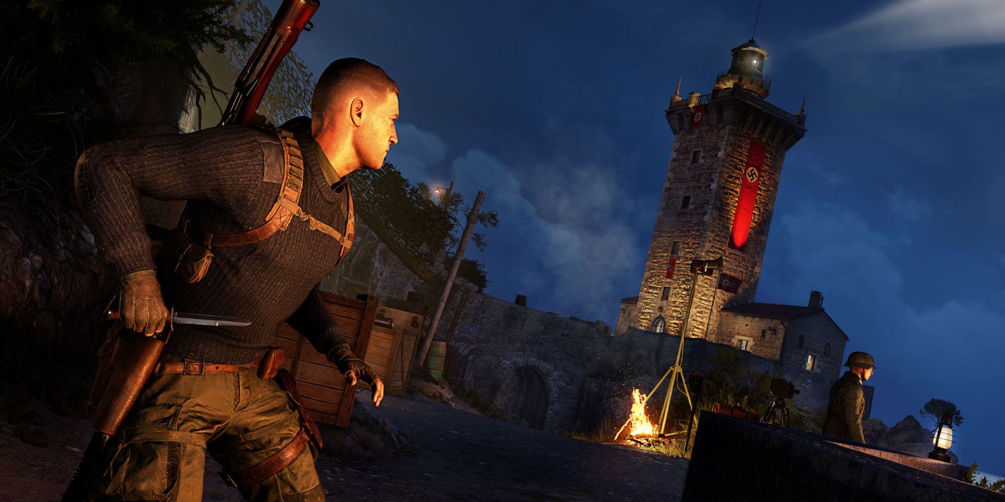 Sniper Elite 5 Screenshot Of Landing Force DLC Mission With Karl Holding Knife and Sneaking up to guard