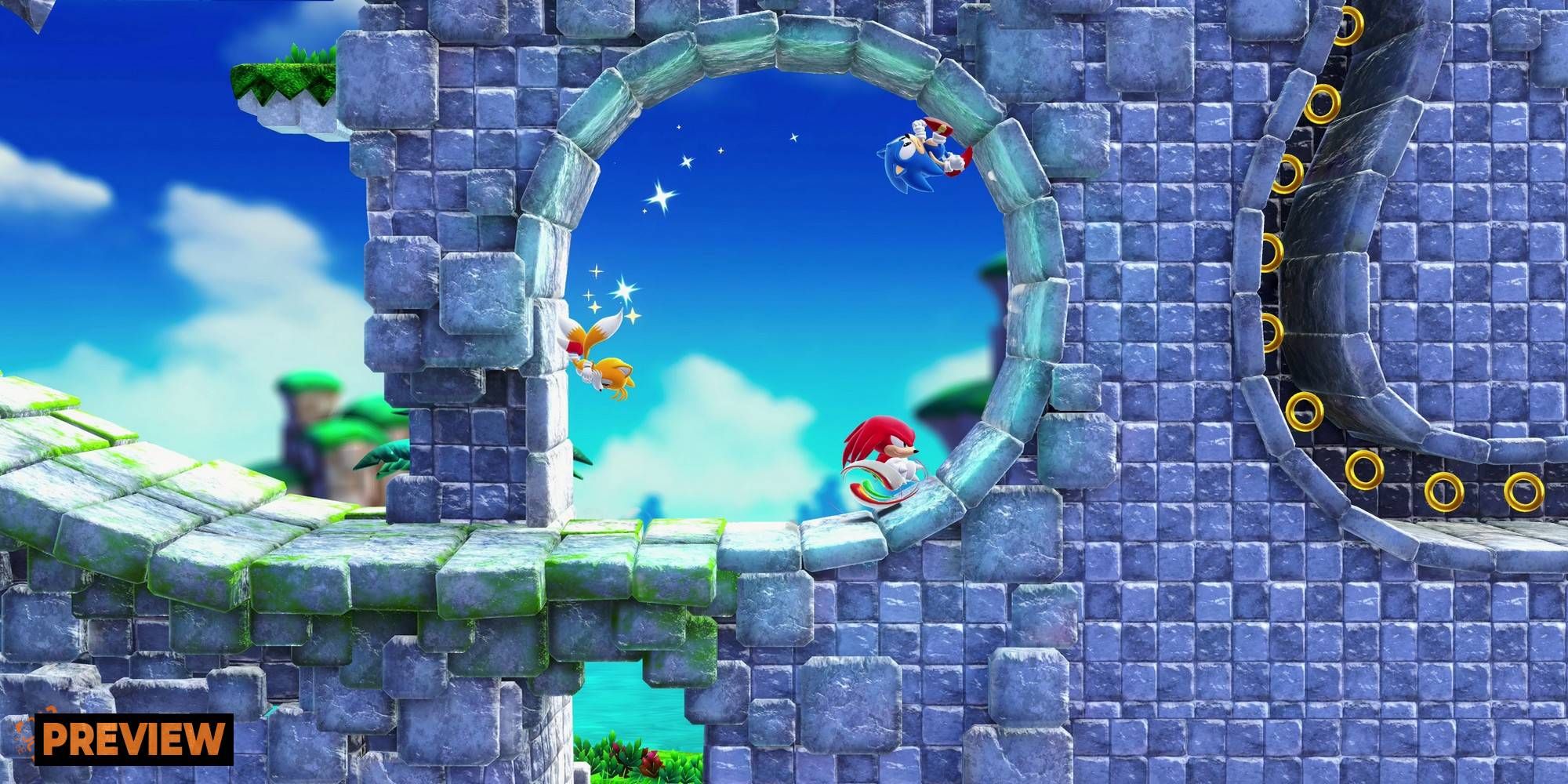 tails knuckles and sonic running through a loop sonic superstars