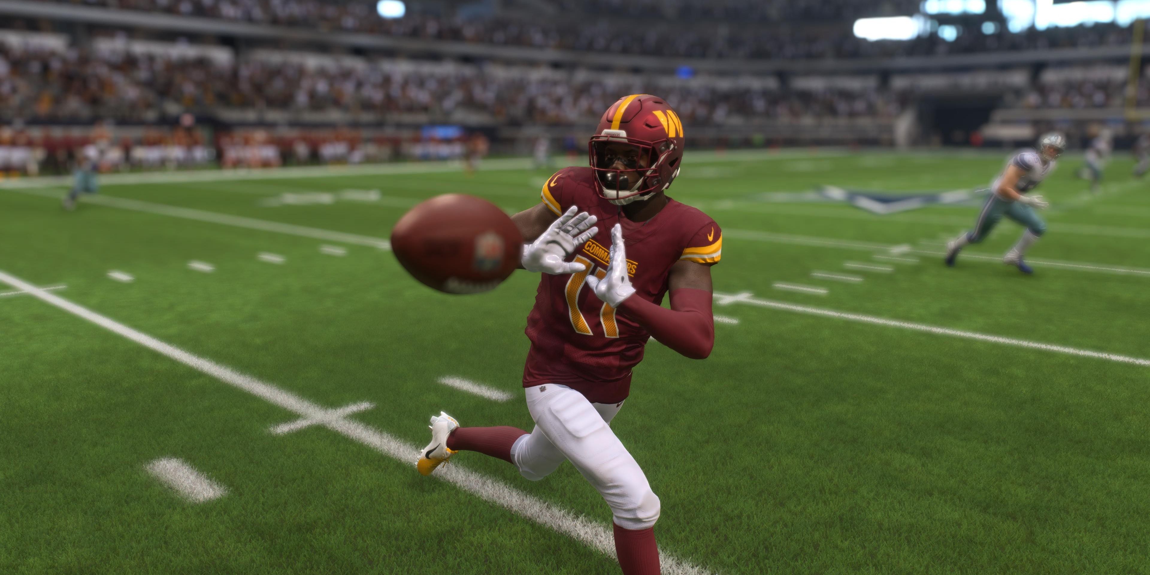 Terry McLaurin making a catch in the middle of the field