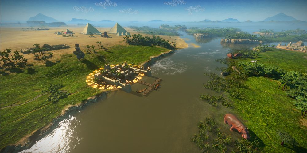 An Egyptian city on the Nile, with the Pyramids and Sphinx in the background, in Total War: Pharaoh