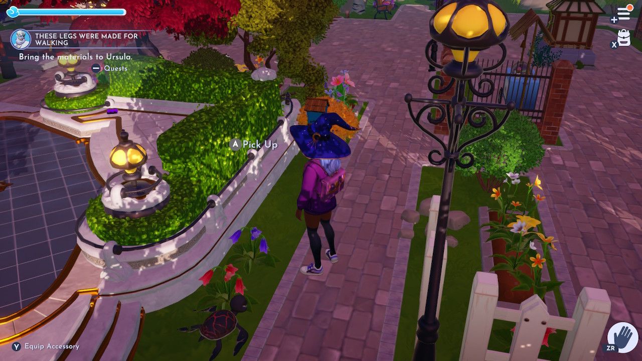 Player character standing next to a purple falling penstemon flower in the Plaza in Disney Dreamlight Valley.