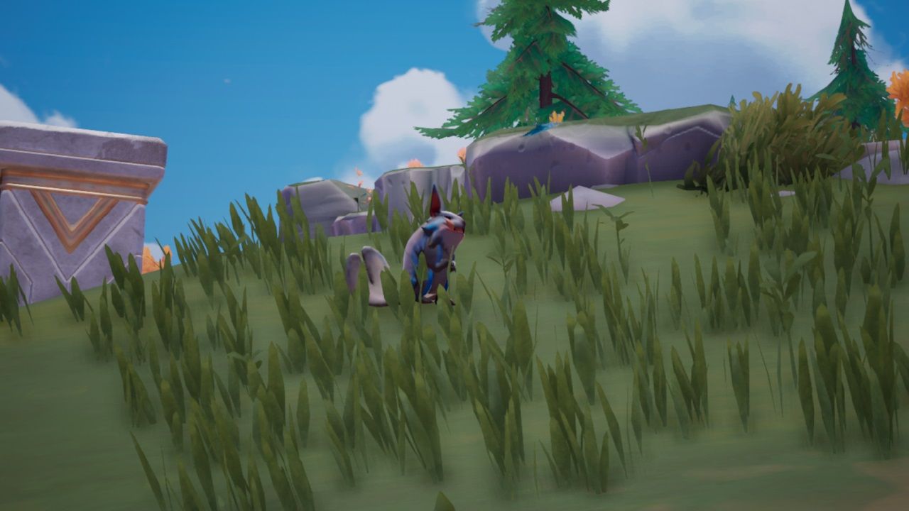 Close-up shot of an Azure Chapaa, a silver creature with blue markings and a flat tail, sitting up in the grass in Bahari Bay during the day in Palia.