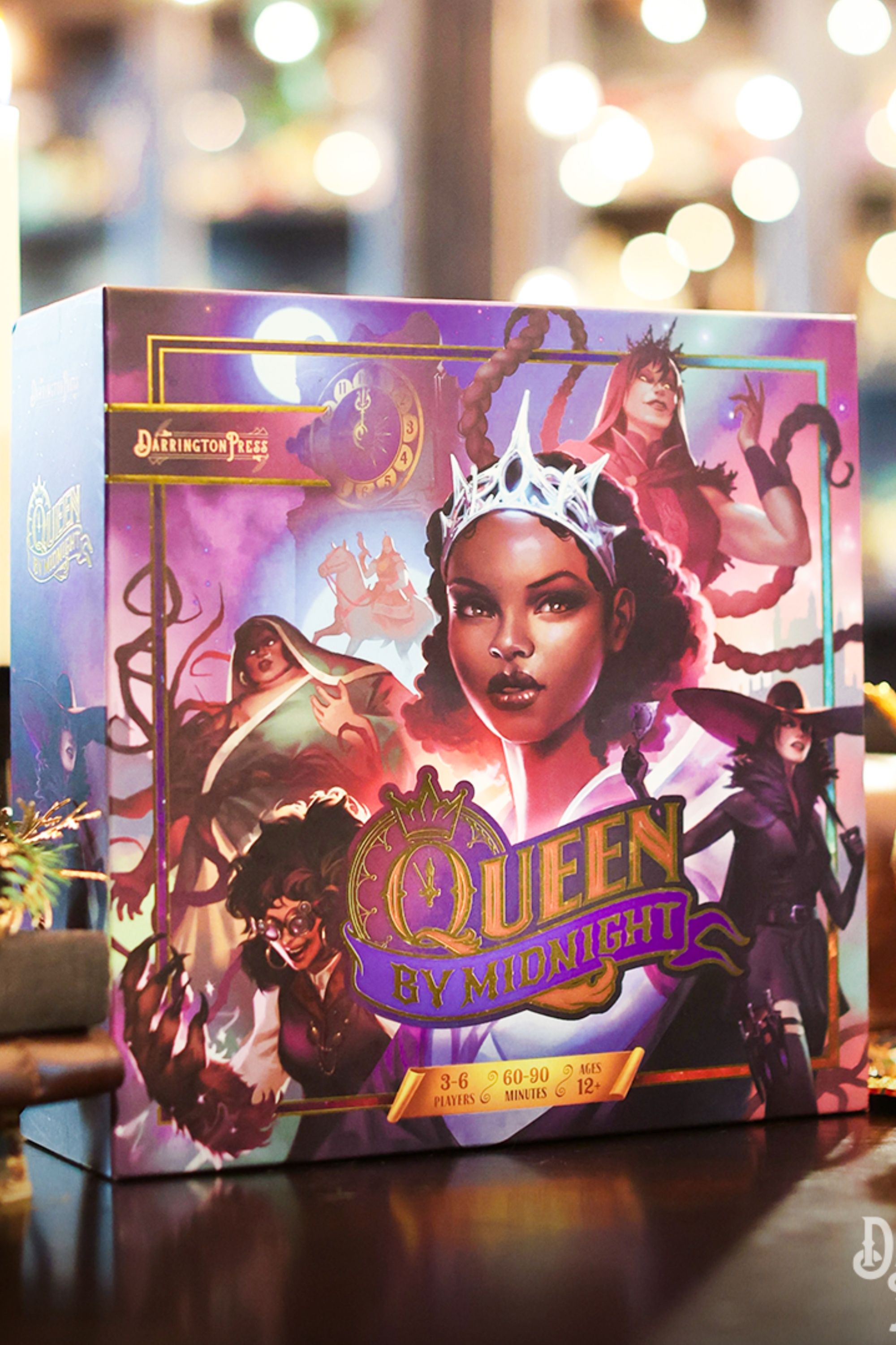 queen by midnight board game on a table