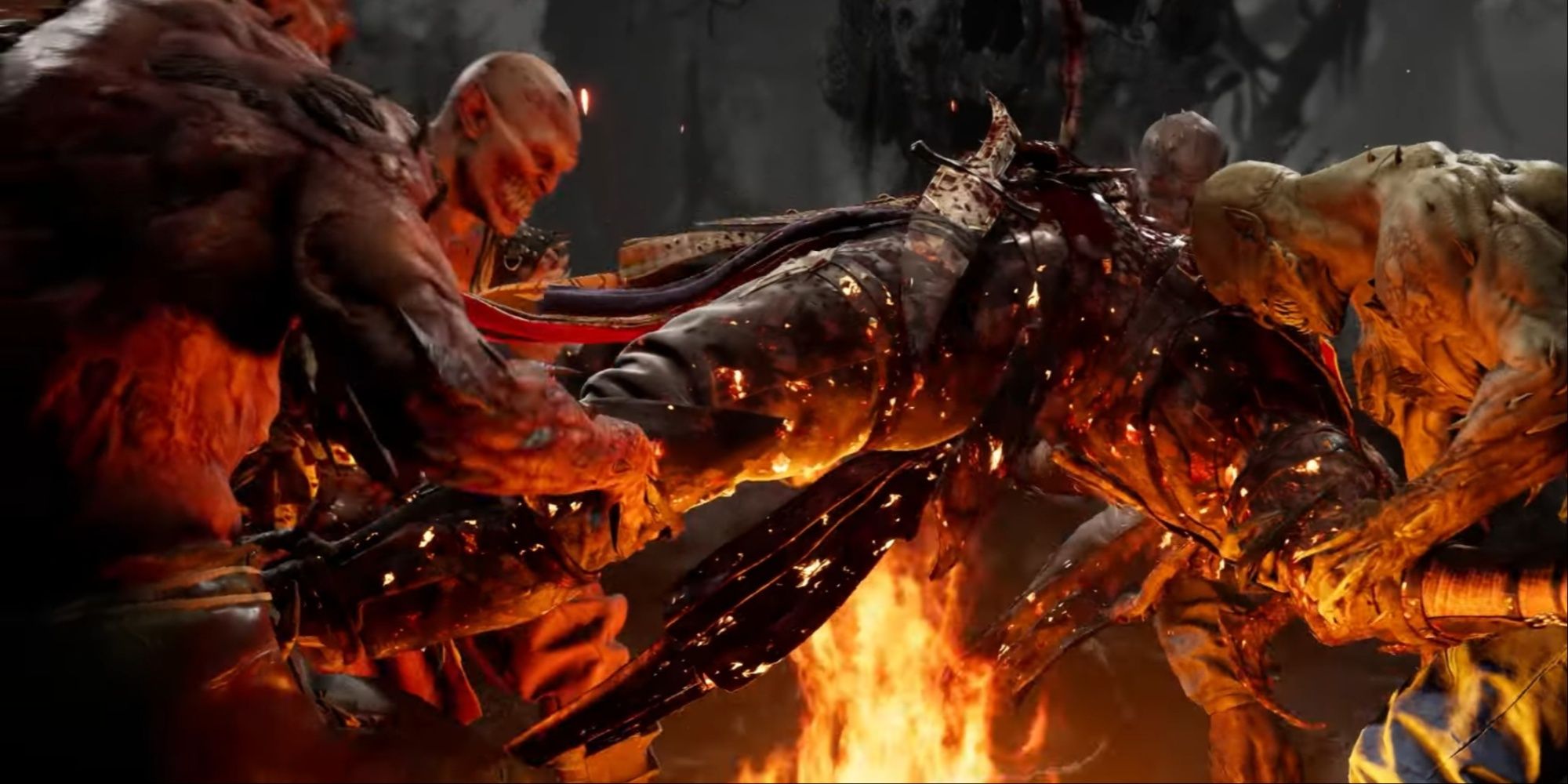 Baraka and fellow Tarkatans tearing apart the limbs of a fighter hanging over a fire.