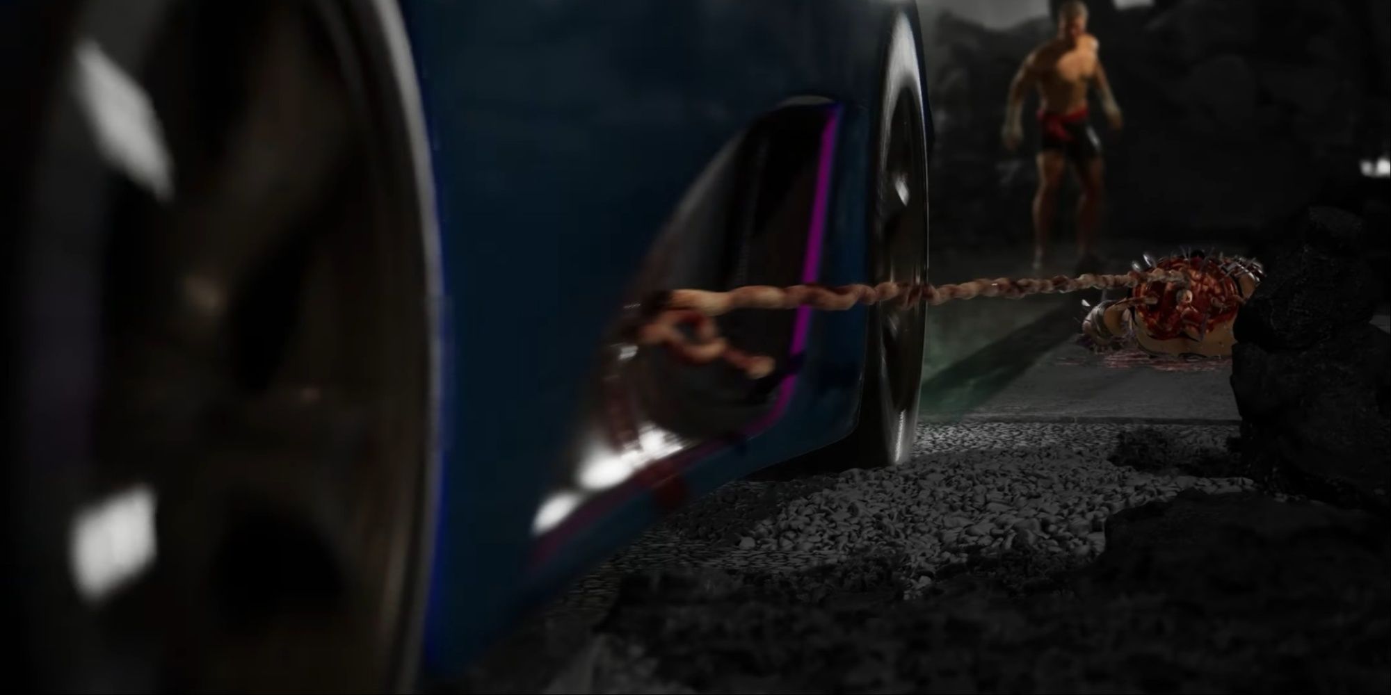 A fighter's intestine lodged into the door of Johnny's exotic car, about to drag the character across the ground.