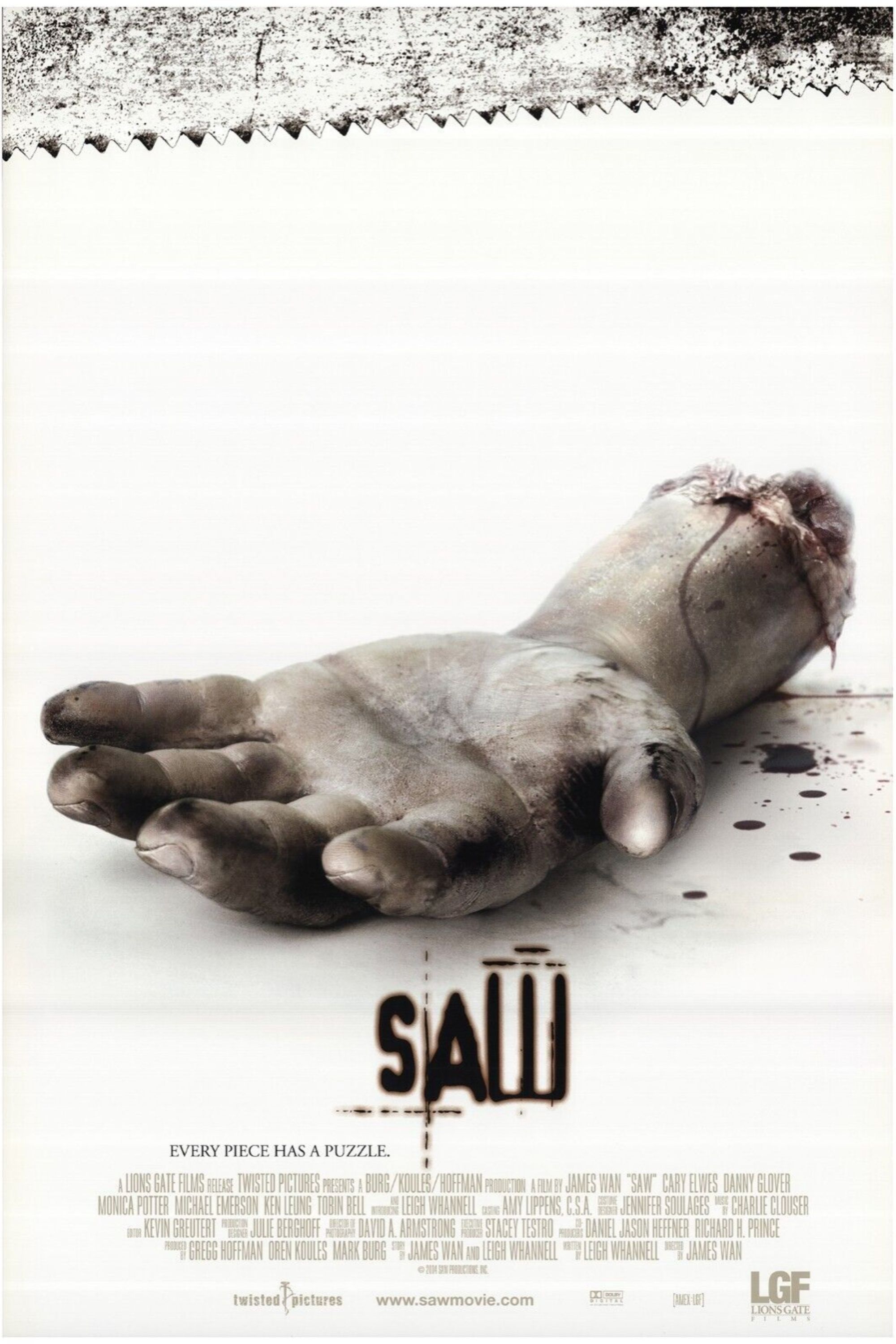 a severed hand on the saw movie poster