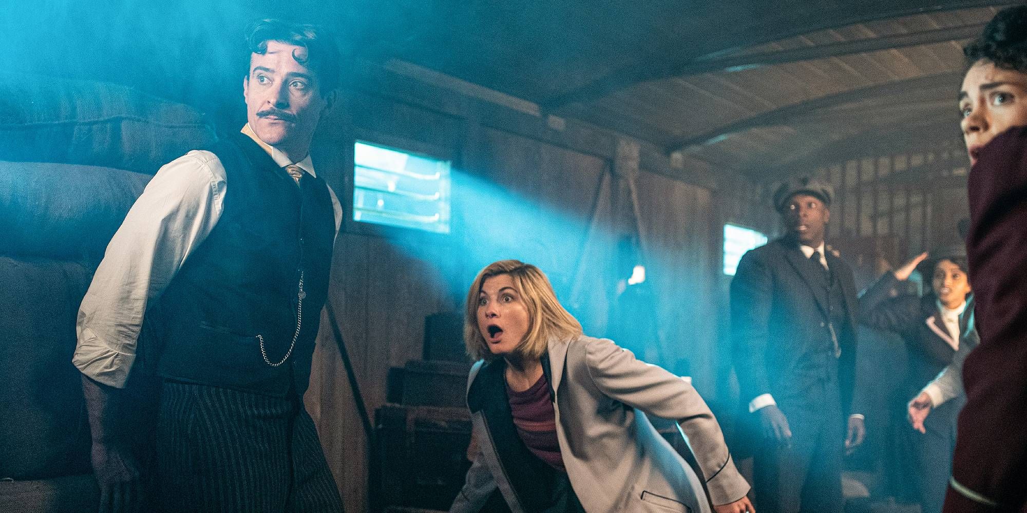 The 13th Doctor, companions and Nikola Tesla in a warehouse
