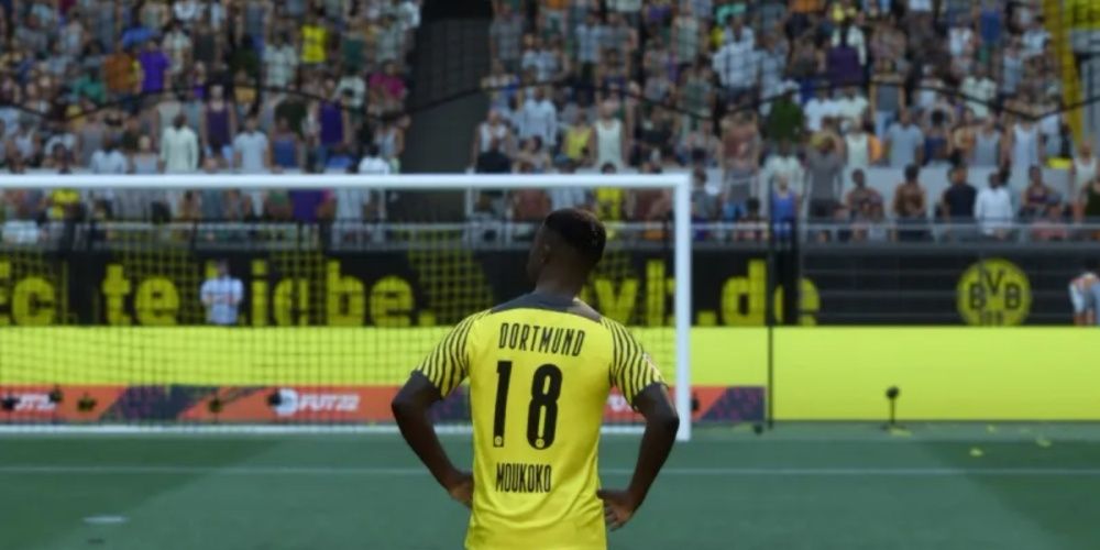 EA Sports FC 24 Screenshot Of Dortmund Player Moukoko With His Back To The Camera