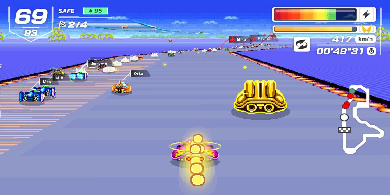 F-Zero 99 Tips And Tricks - The Fire Stingray Collecting Super Sparks While Driving Behind The Golden Car In Mute City