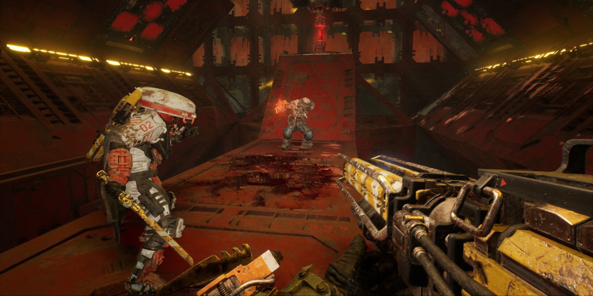 Two players face an enemy in a hallway