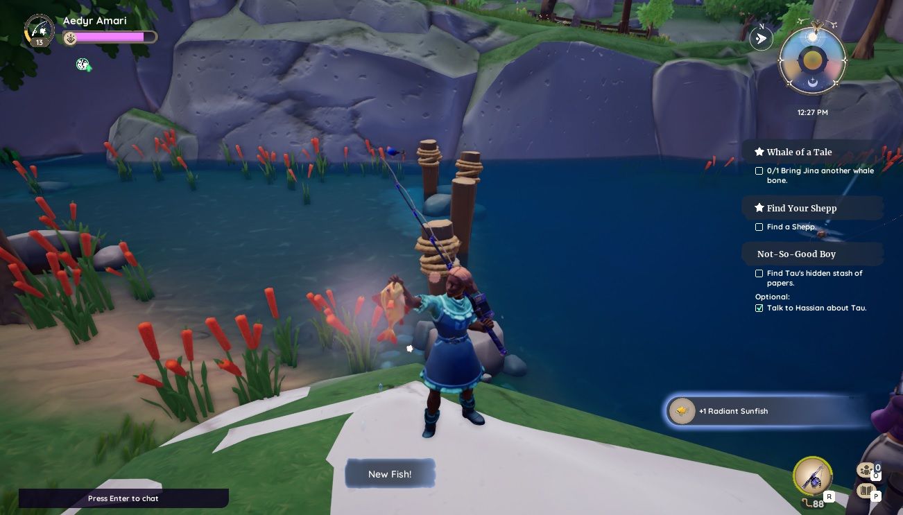 Player character holding up a freshly caught Radiant Sunfish while standing by a river in Kilima Valley in Palia.