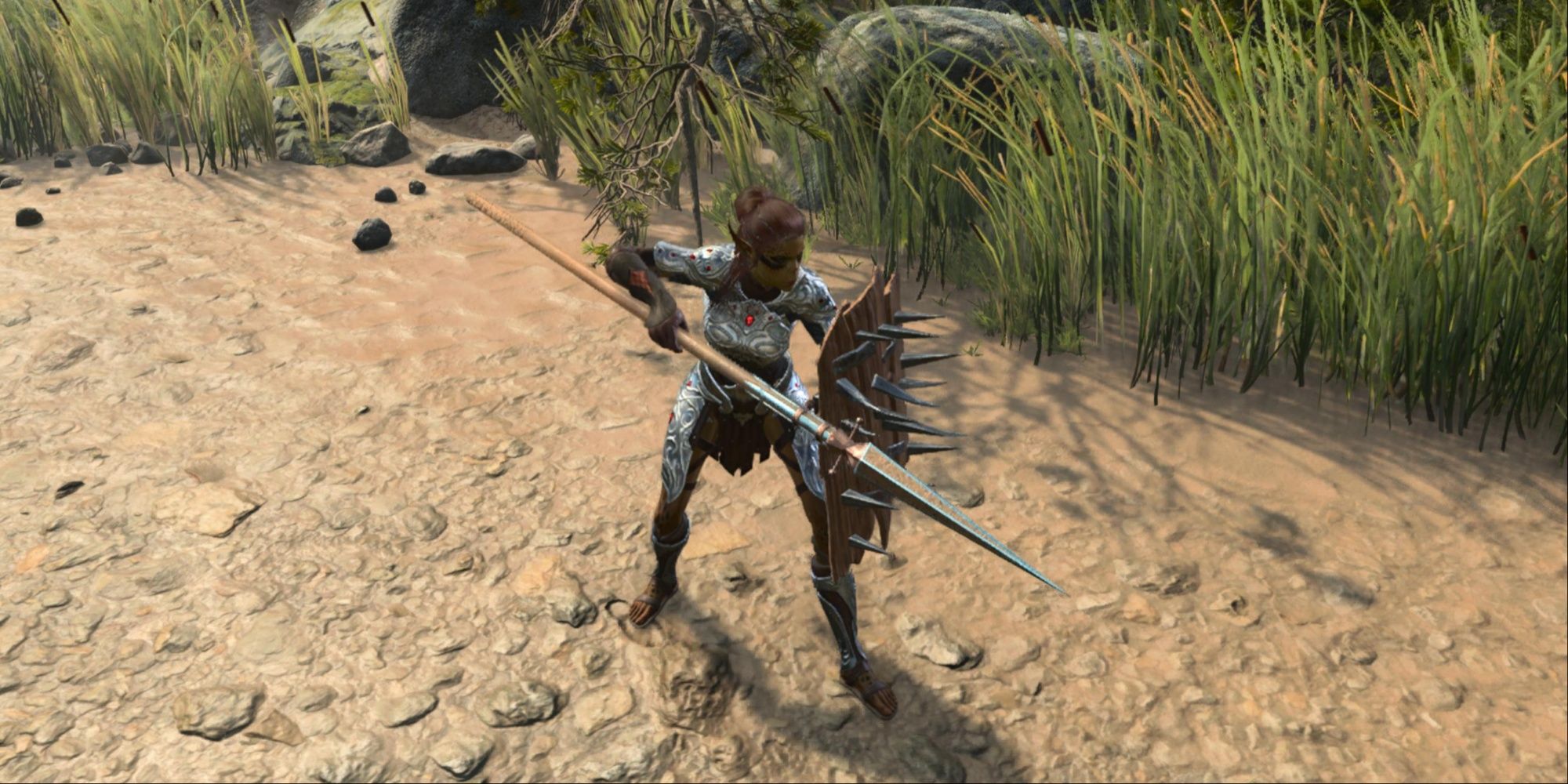 Lae'zel wielding a spear and a shield in Baldur's Gate 3.