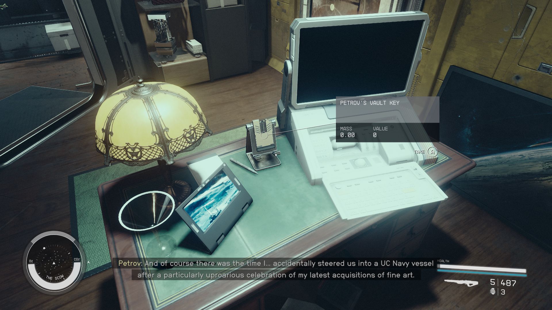 Petrov's Vault Key is on a desk next to a computer in his office aboard the Scow.