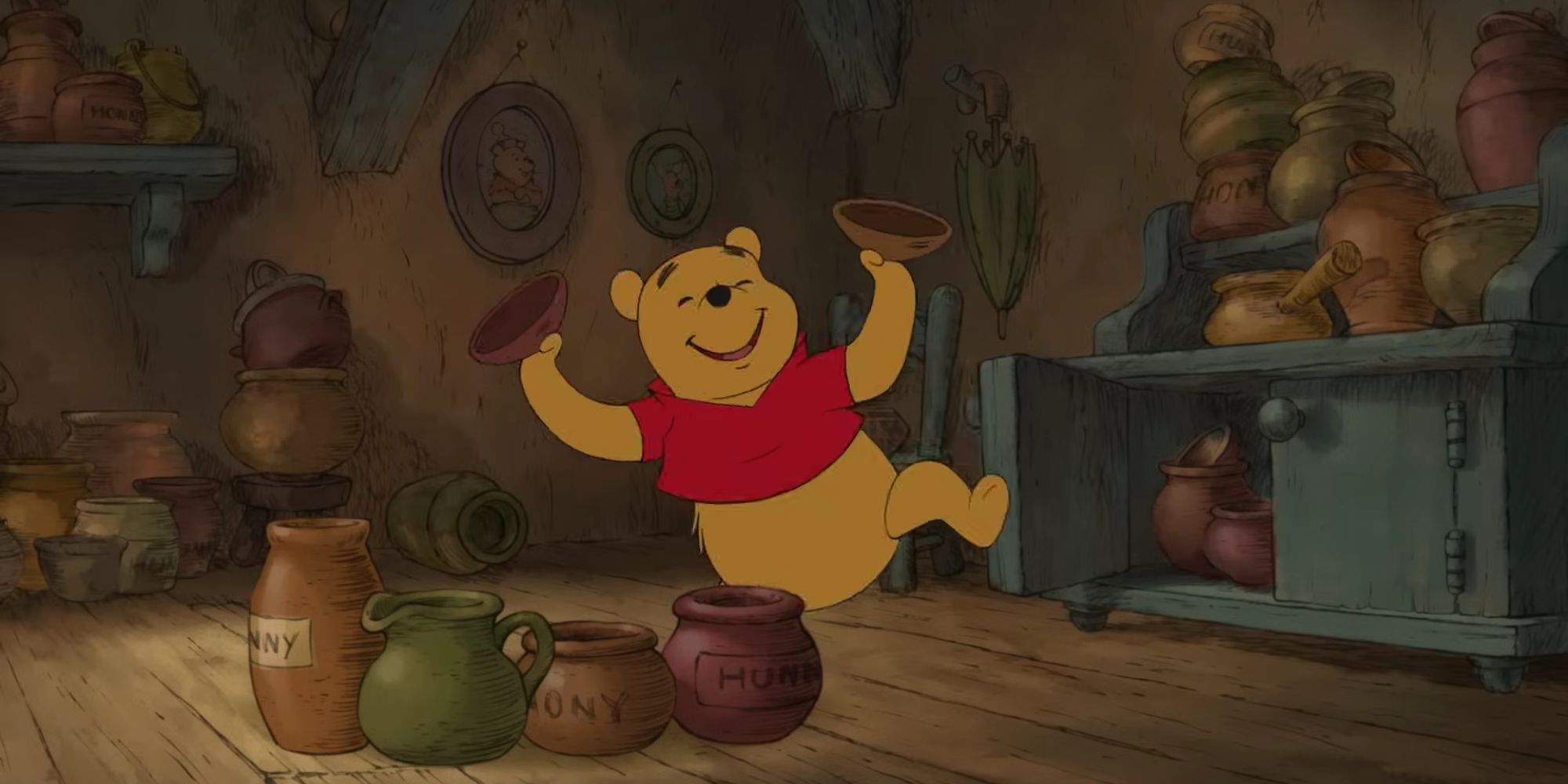 Winnie the Pooh dancing with honey pots.