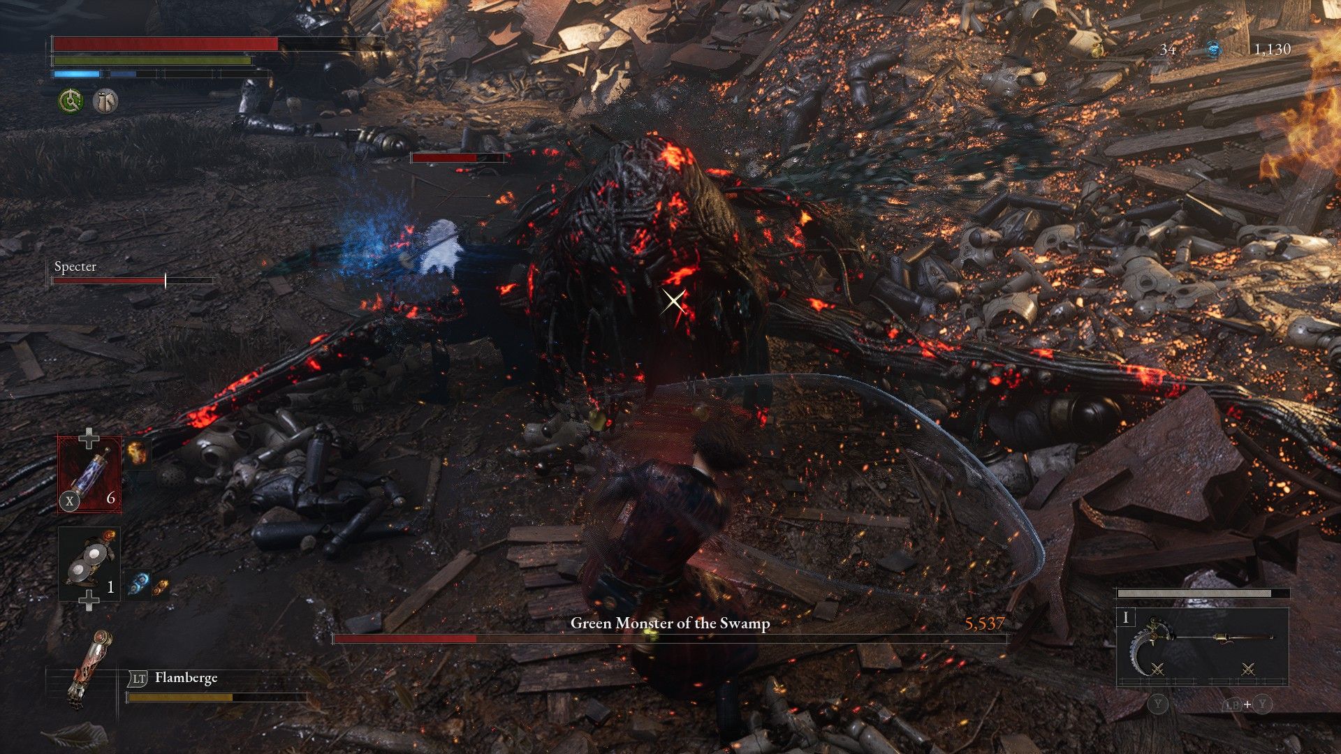 P attacks Green Monster as it lays on the ground on fire after wasting resources in Phase One in Lies of P