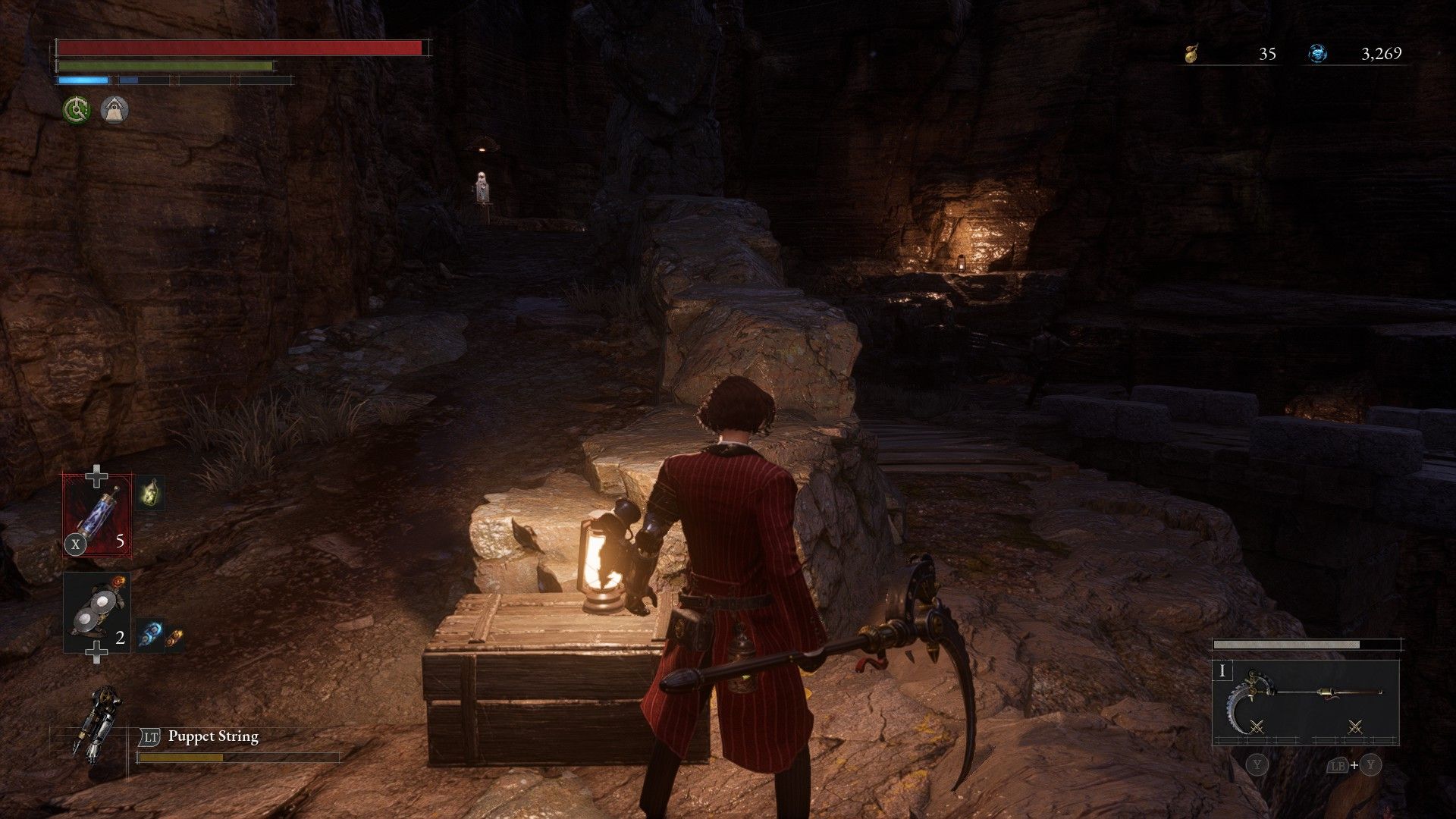 P stands at a path split in the Relic of Trismagistus with King of Riddles payphone alight on left in Lies of P