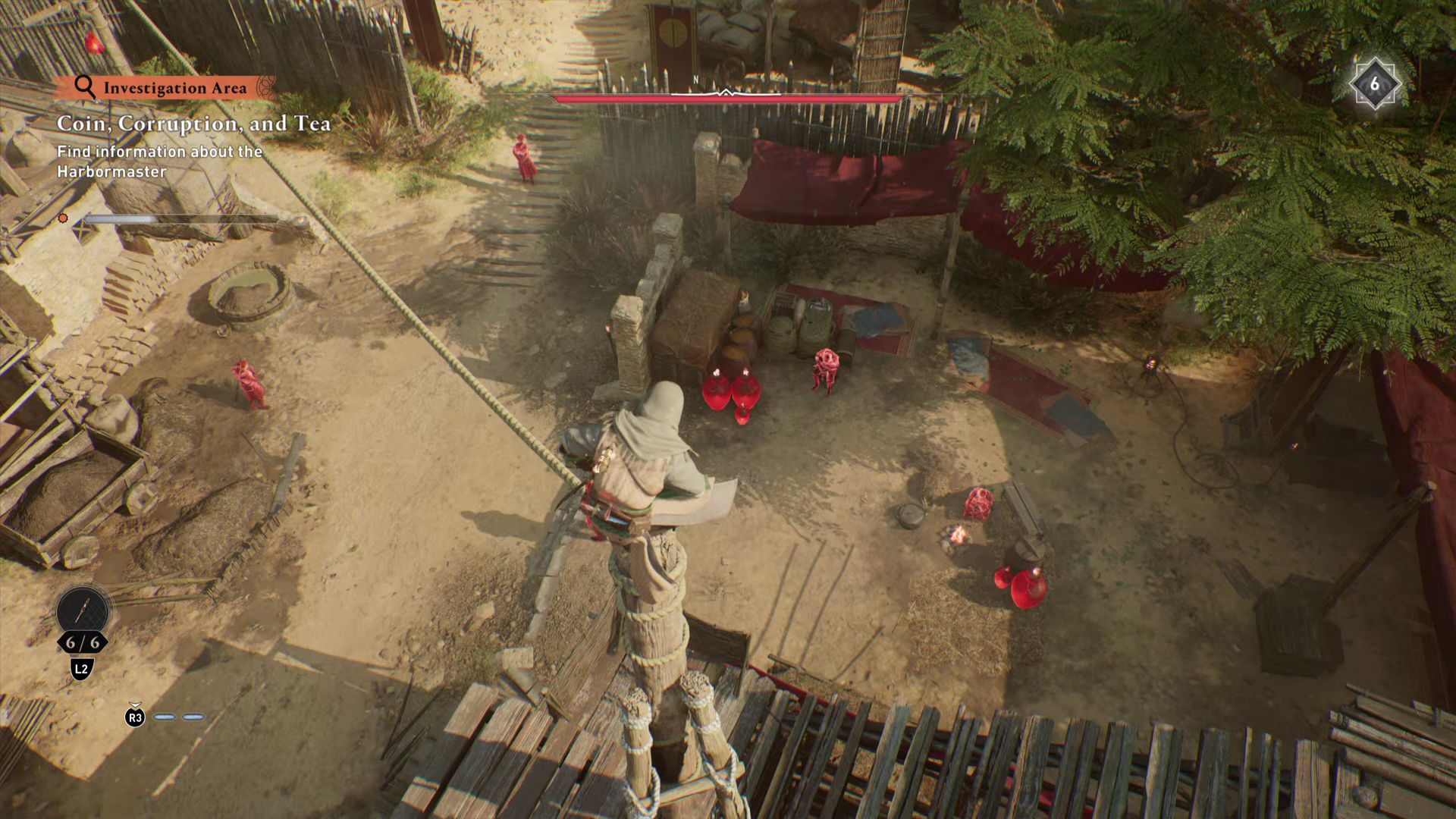 Overlooking a fort full of guards in AC Mirage.