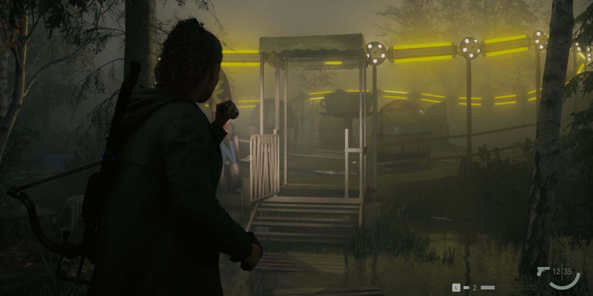Saga Anderson approaches the Percolator, illuminated with yellow lights, at the Coffee World amusement park in Alan Wake 2