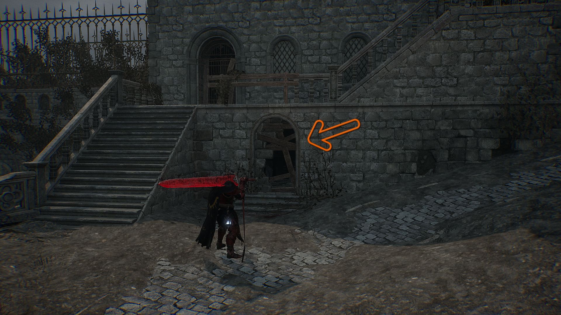 An arrowing showing an entrance blocked by wooden barriers Lords of the Fallen