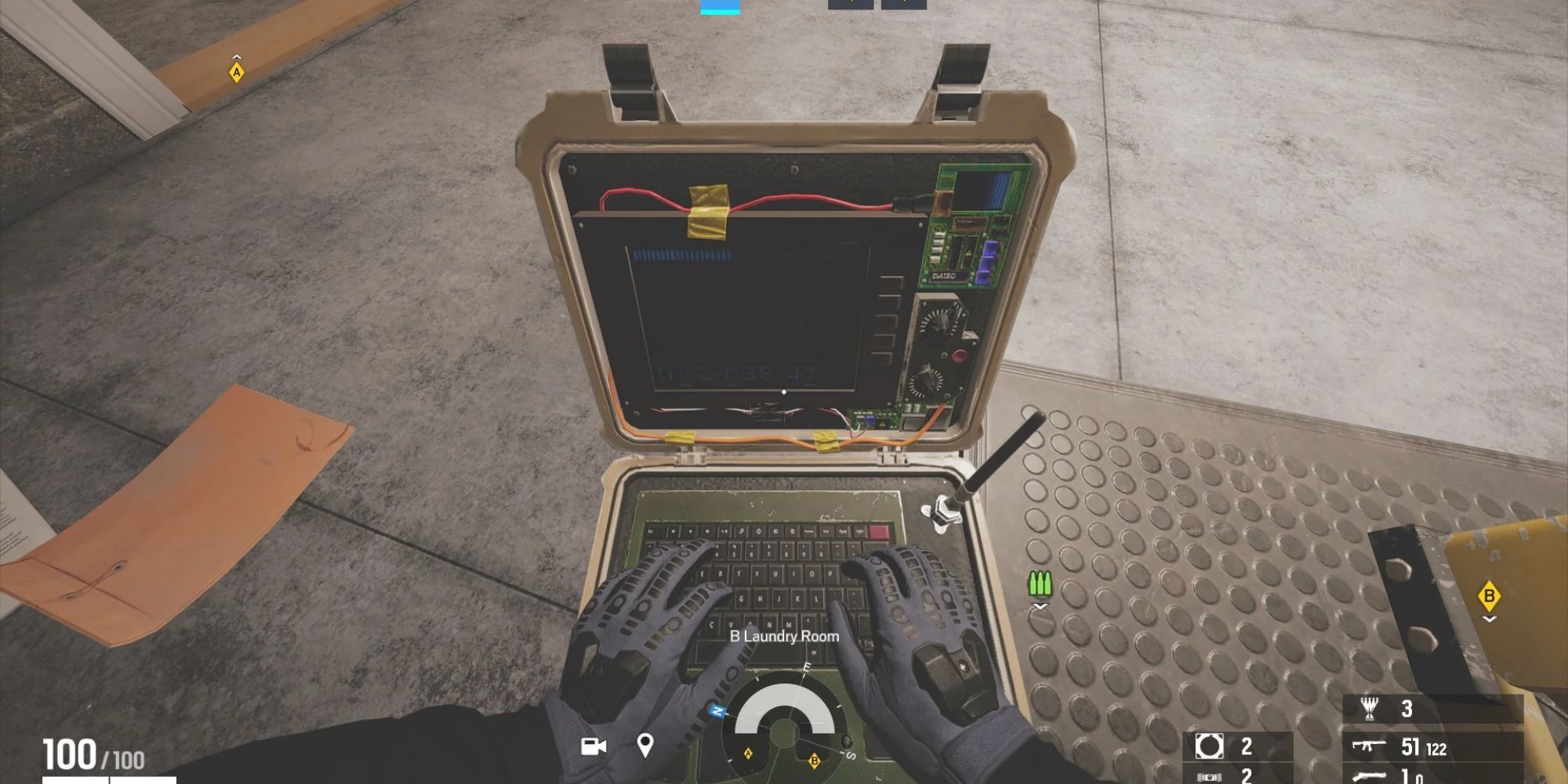 Player planting a bomb in Rainbow Six Siege