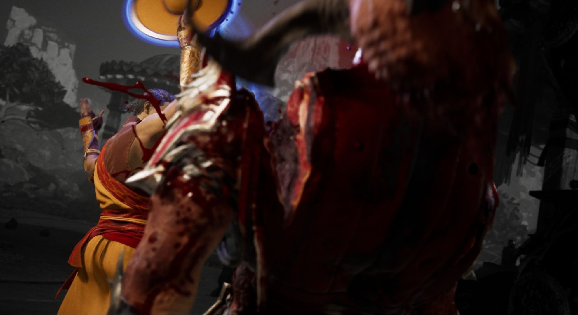 Kung Lao using his first Fatality against General Shao in Mortal Kombat 1.