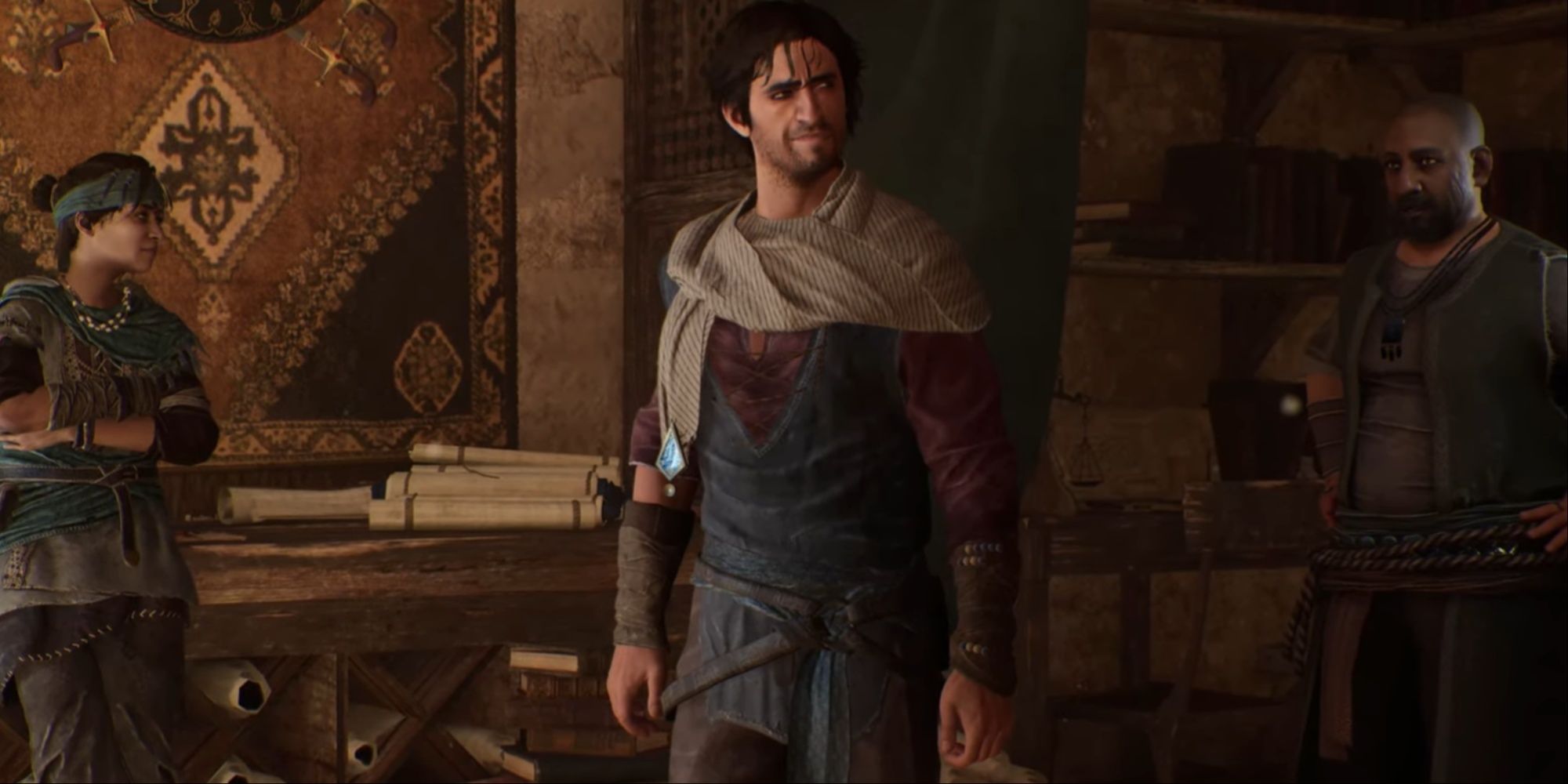 Basim looking to the side in his original character design in Dervis' shop with Nehal leaning on a desk during the first mission.