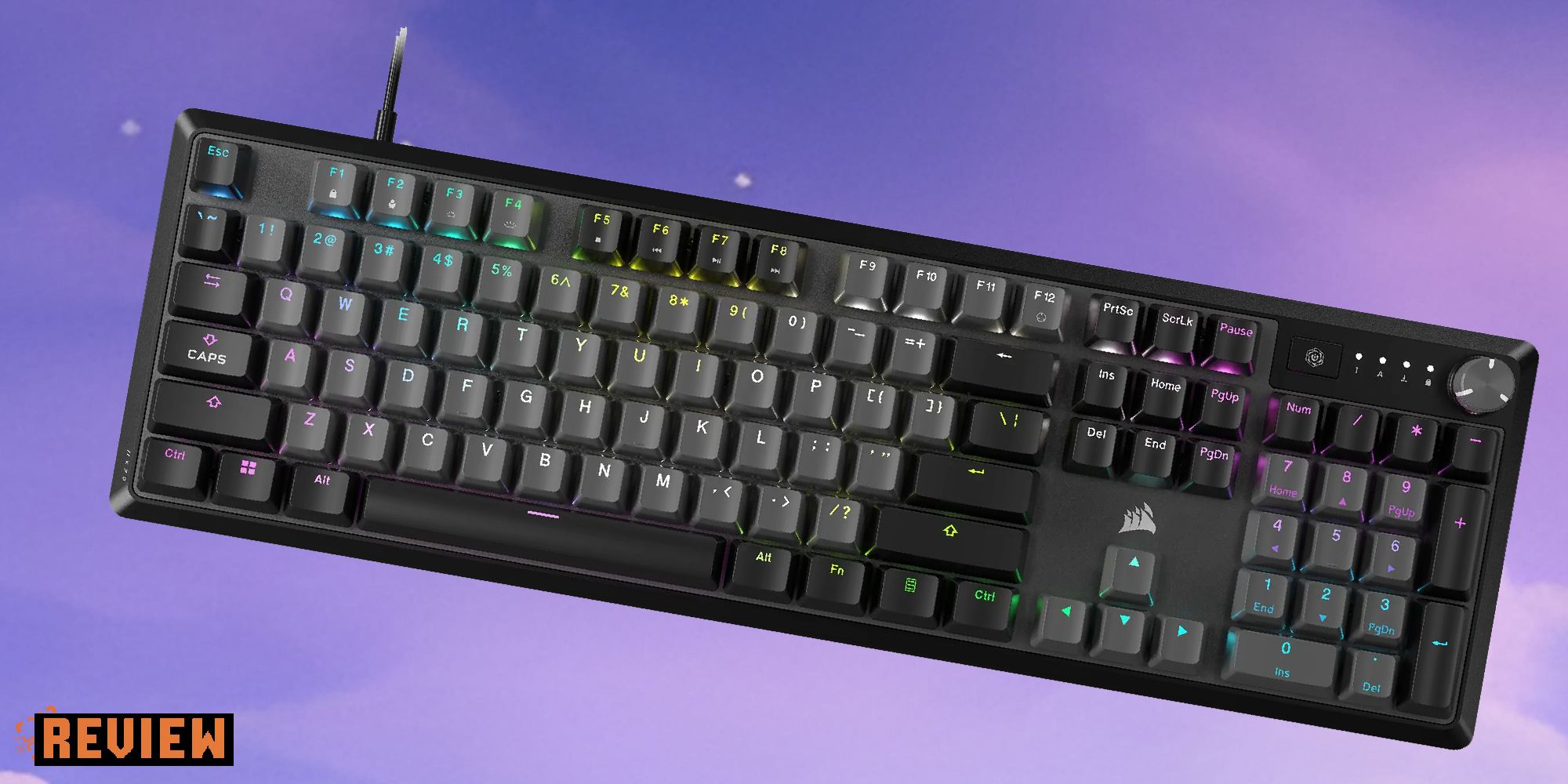 Corsair K70 keyboard over a purple background with the word 'review' in the bottom left