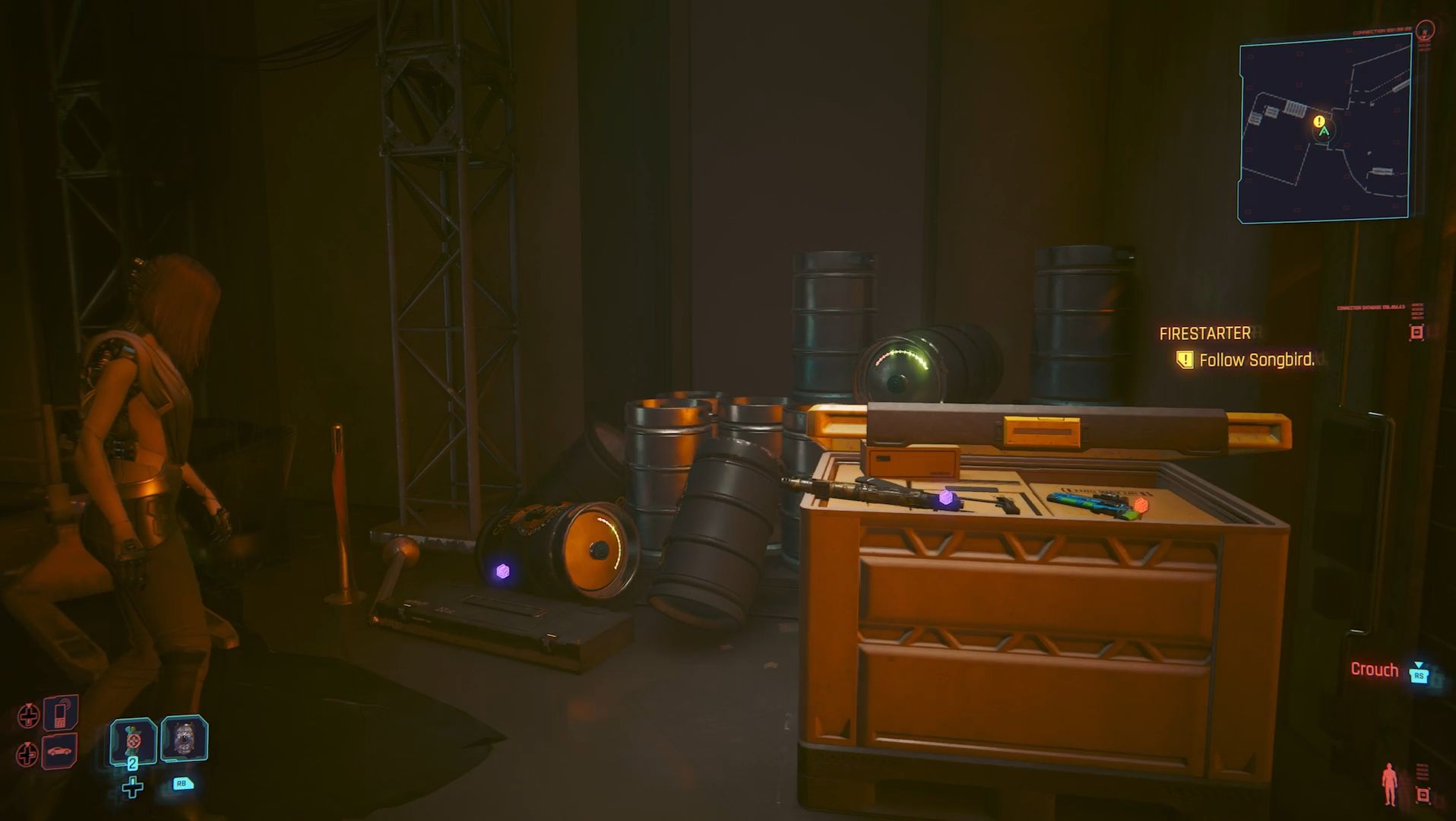 Cyberpunk 2077 Phantom Liberty Screenshot Of Songbird Walking Toward Box Containing Weapons