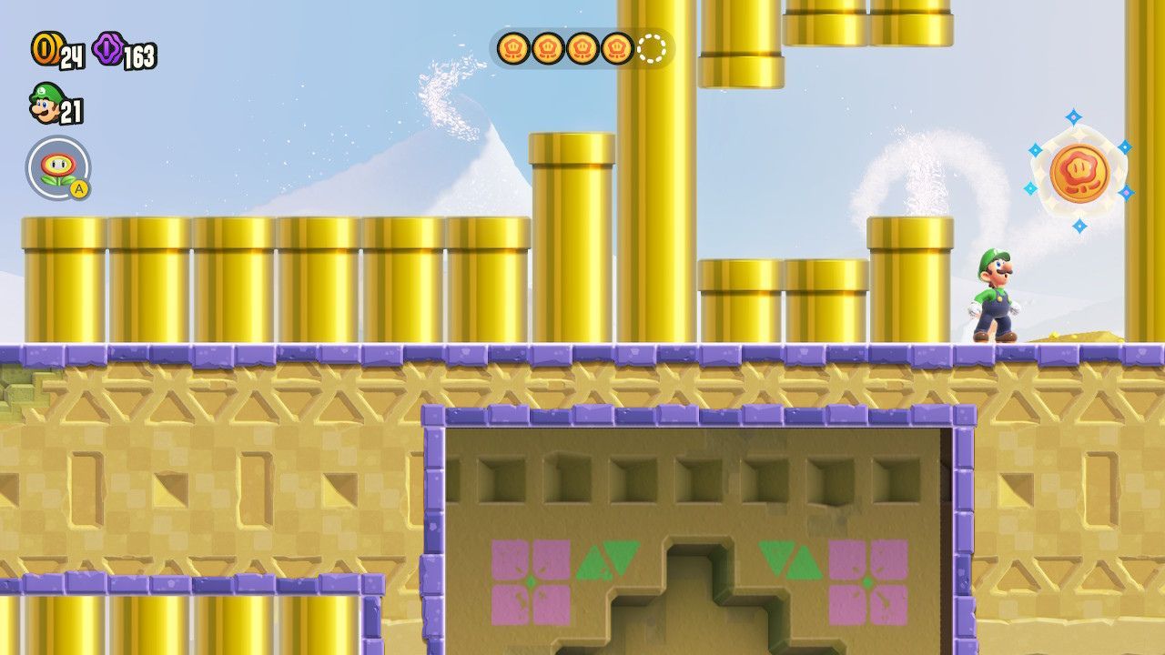 The fifth token revealed after pushing a long yellow pipe to the right.