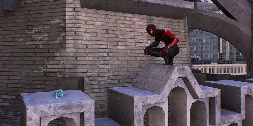 Miles stares at the Spacebound prize trophy which grants the Just Let Go Trophy in Spider-Man 2.