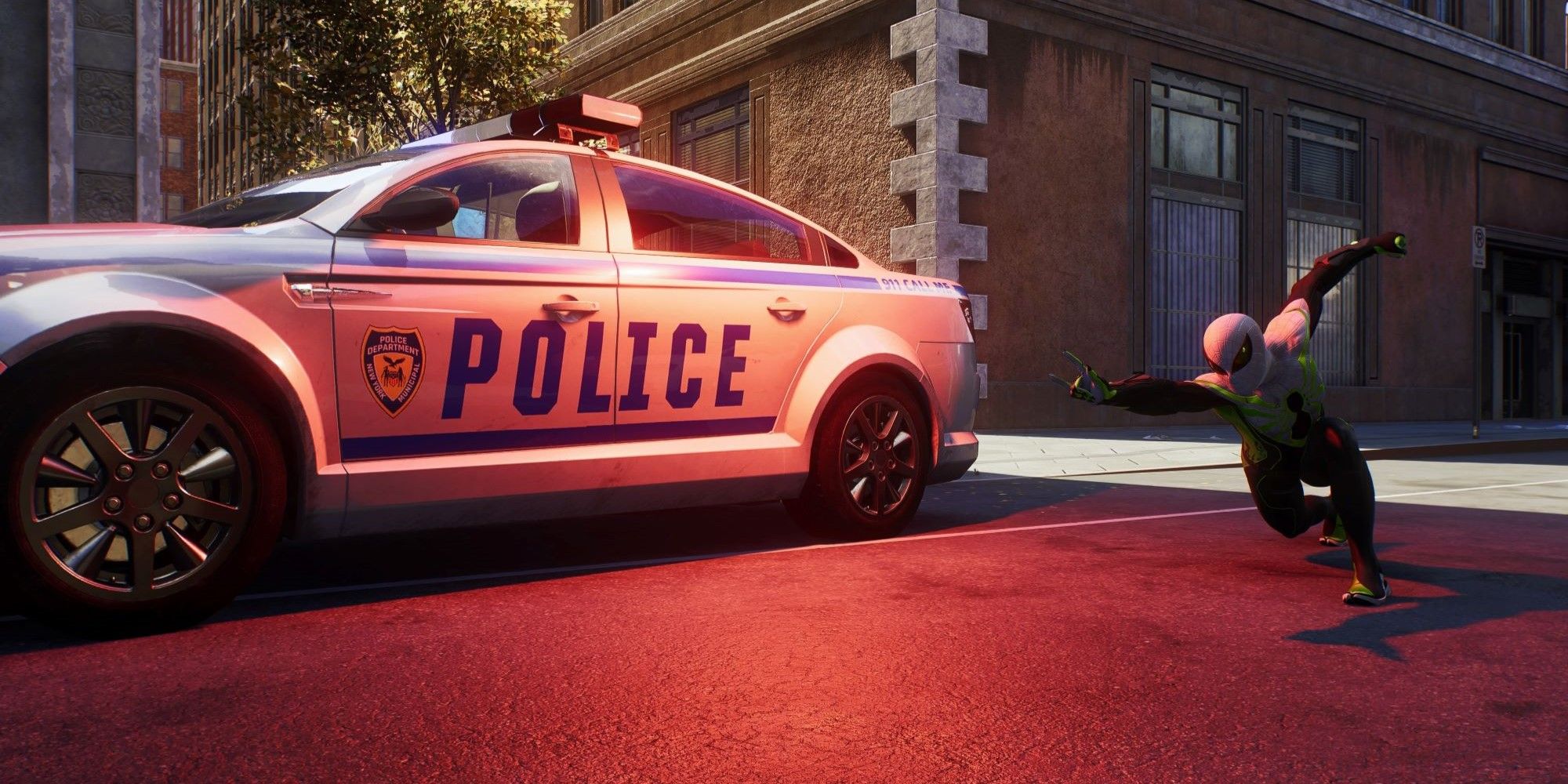 Marvel's Spider-Man 2, Superior Spider standing next to a police car with lights flashing