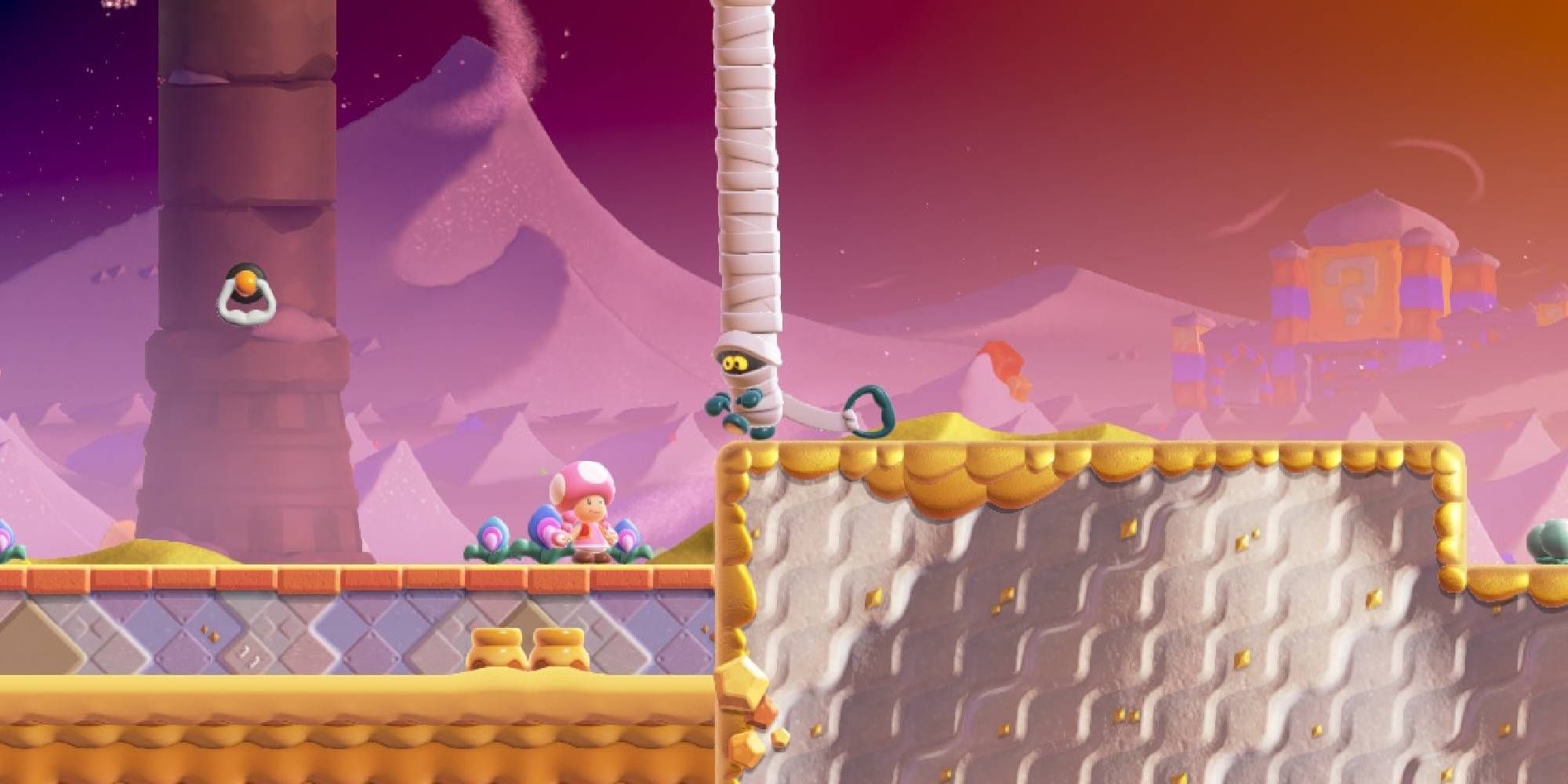 super mario wonder toadette facing a mumsie